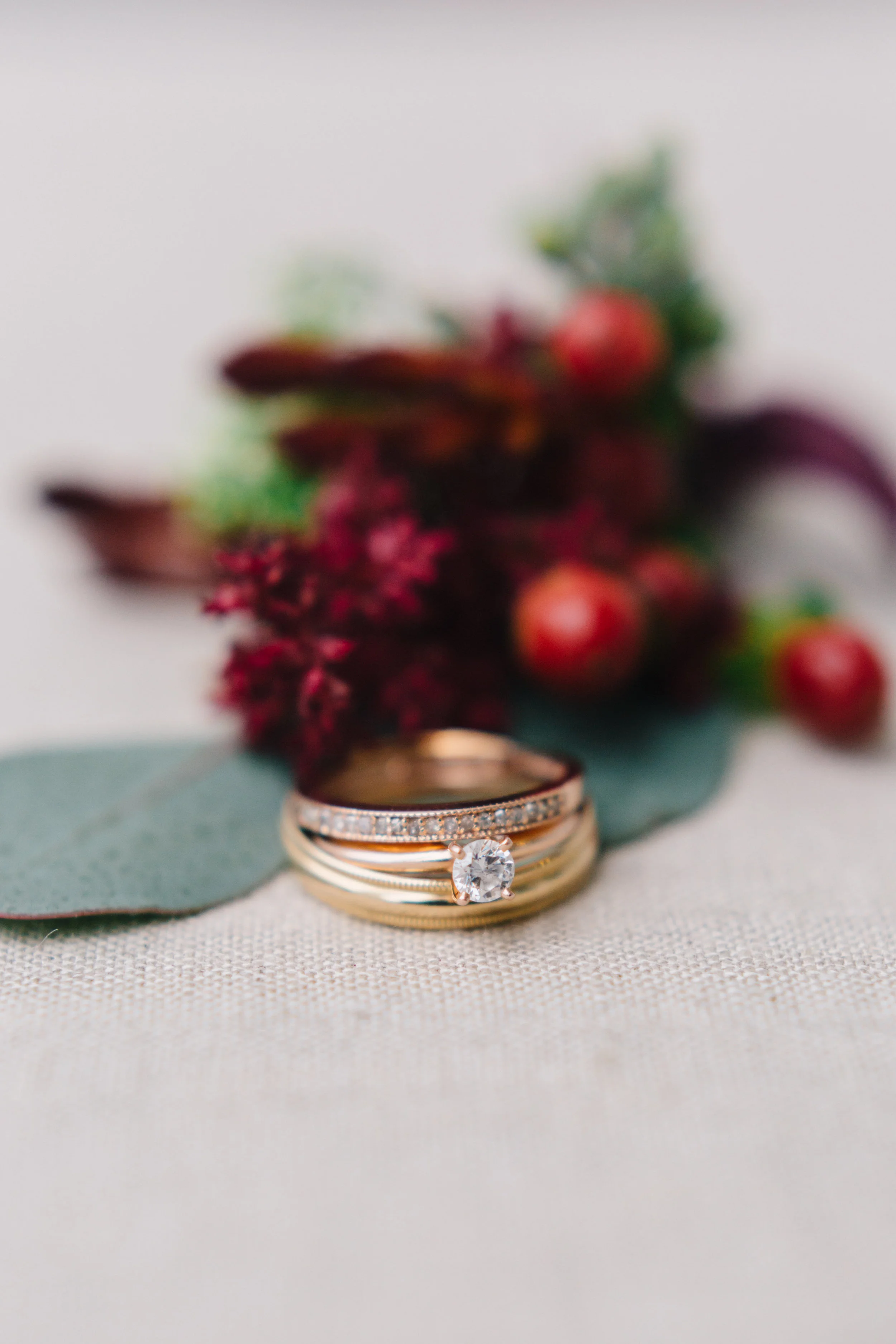 Detail Shot Boutonniere and Wedding Rings | Photo by Four Corners Photography
