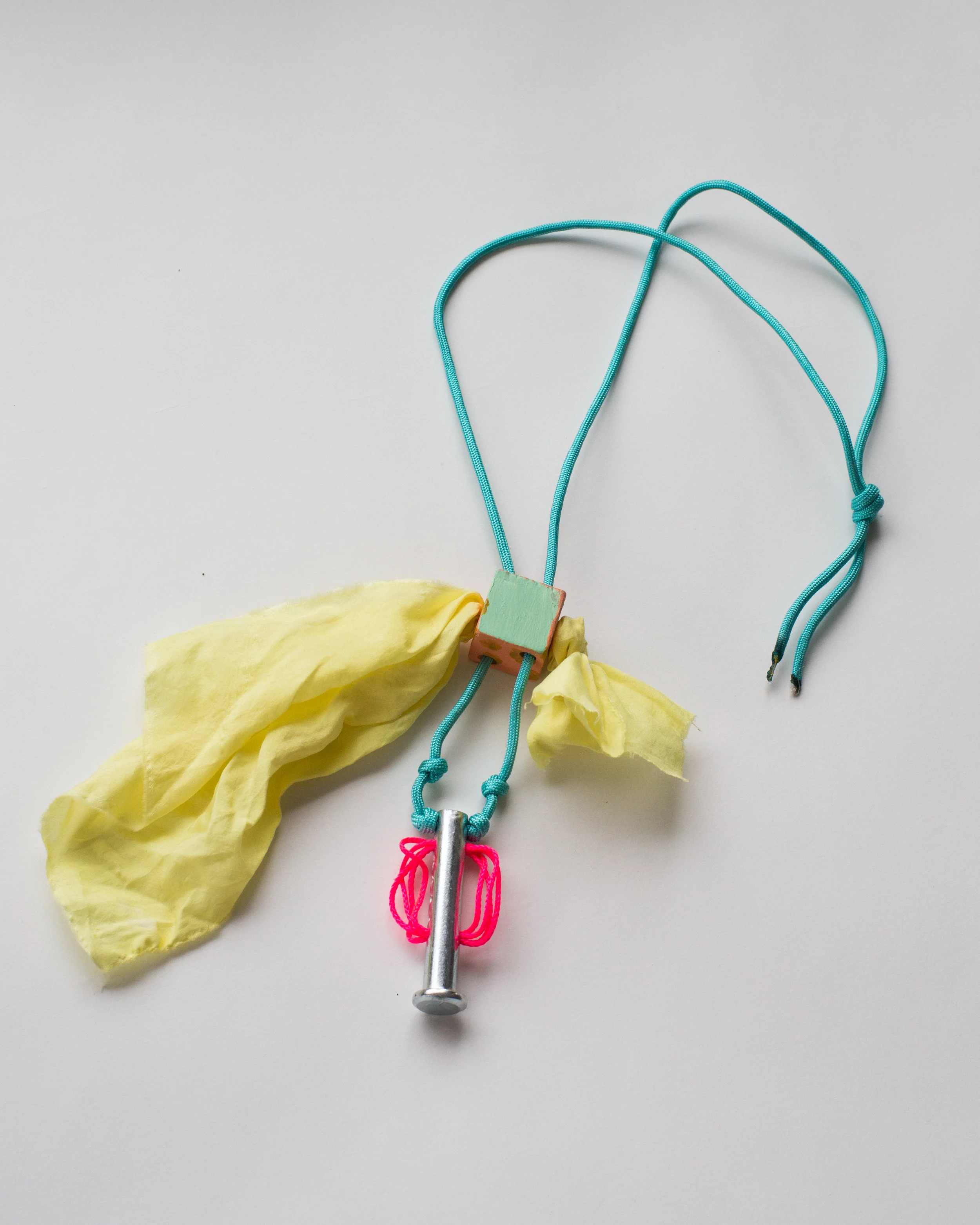   Partyperson necklace , Weld on silk, wood, acrylic paint, clevis pin, mason twine, para-cord   