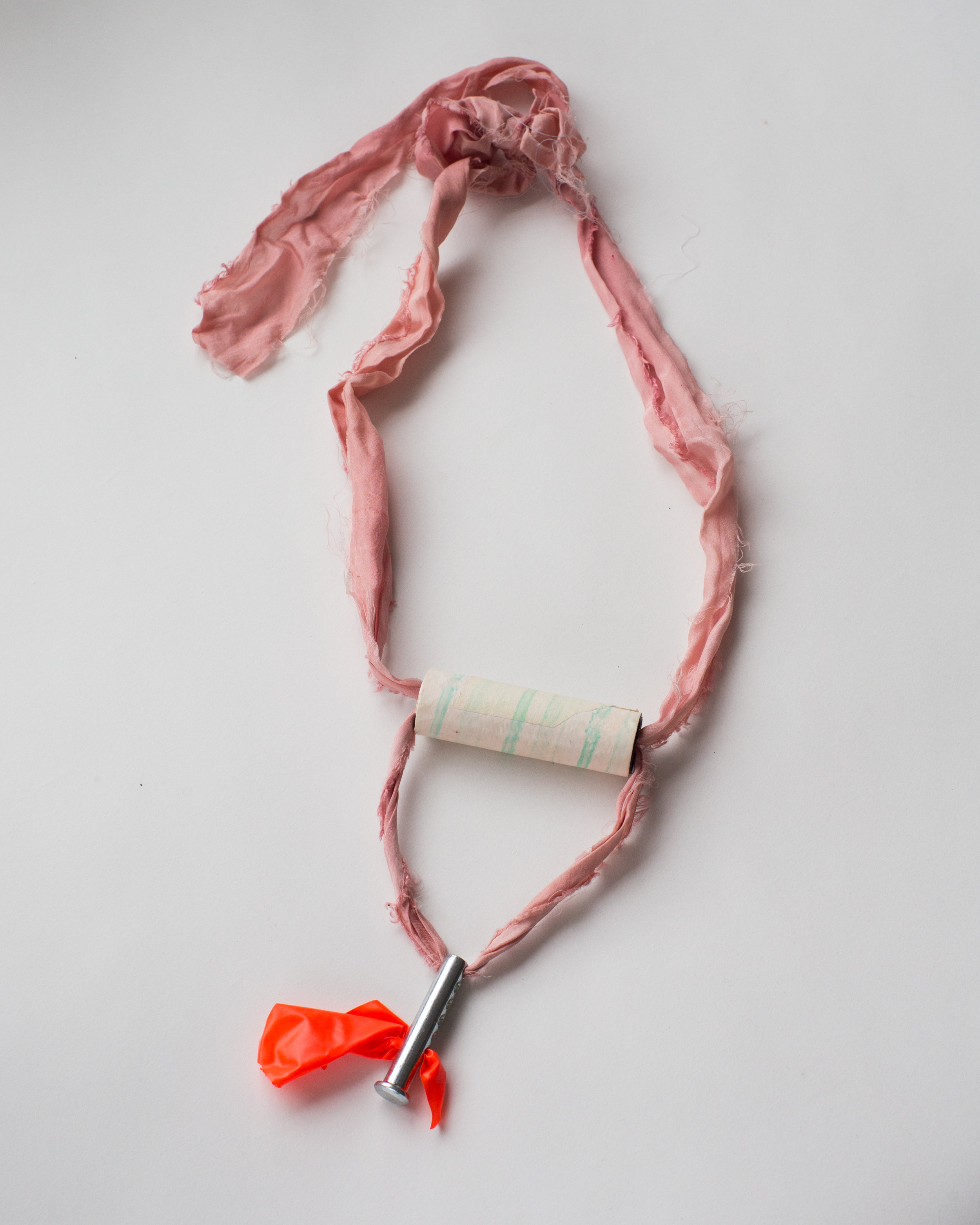   Necklace for register operators , Lac and Quebracho red on silk, receipt paper, landscaping flag, clevis pin   
