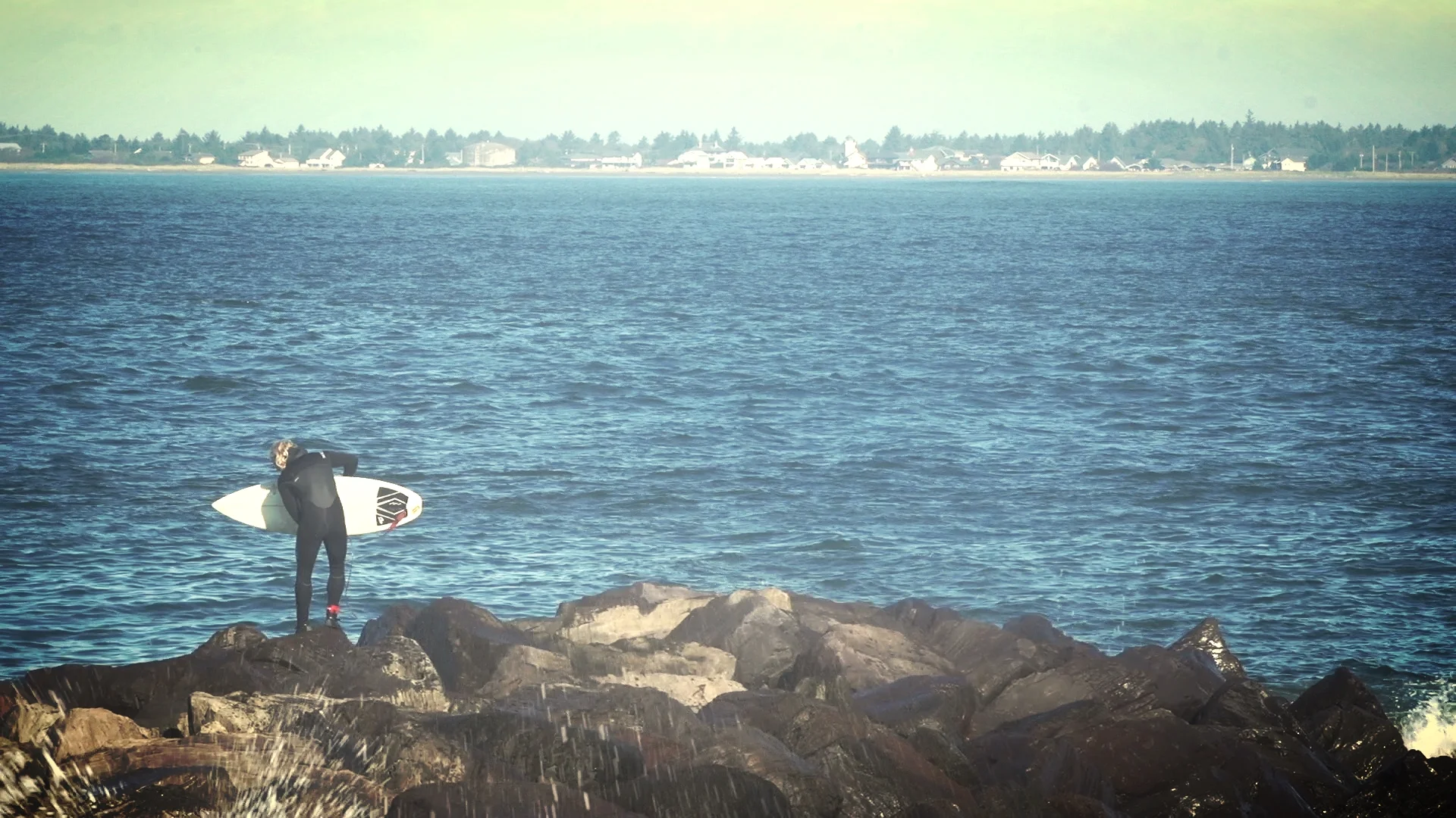 surfer_on_rocks.jpg
