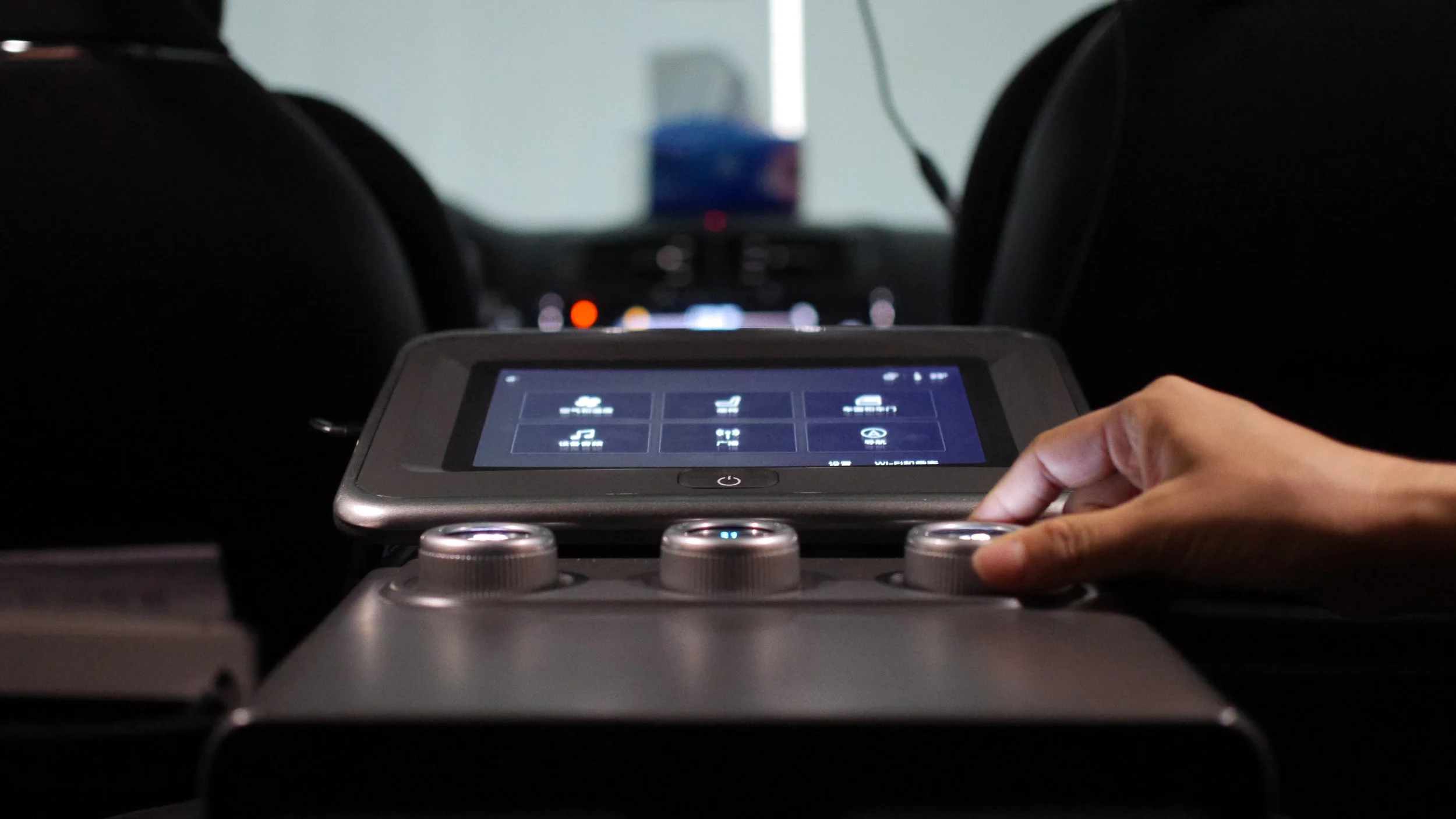 Center armrest touchscreen and hardware control interface