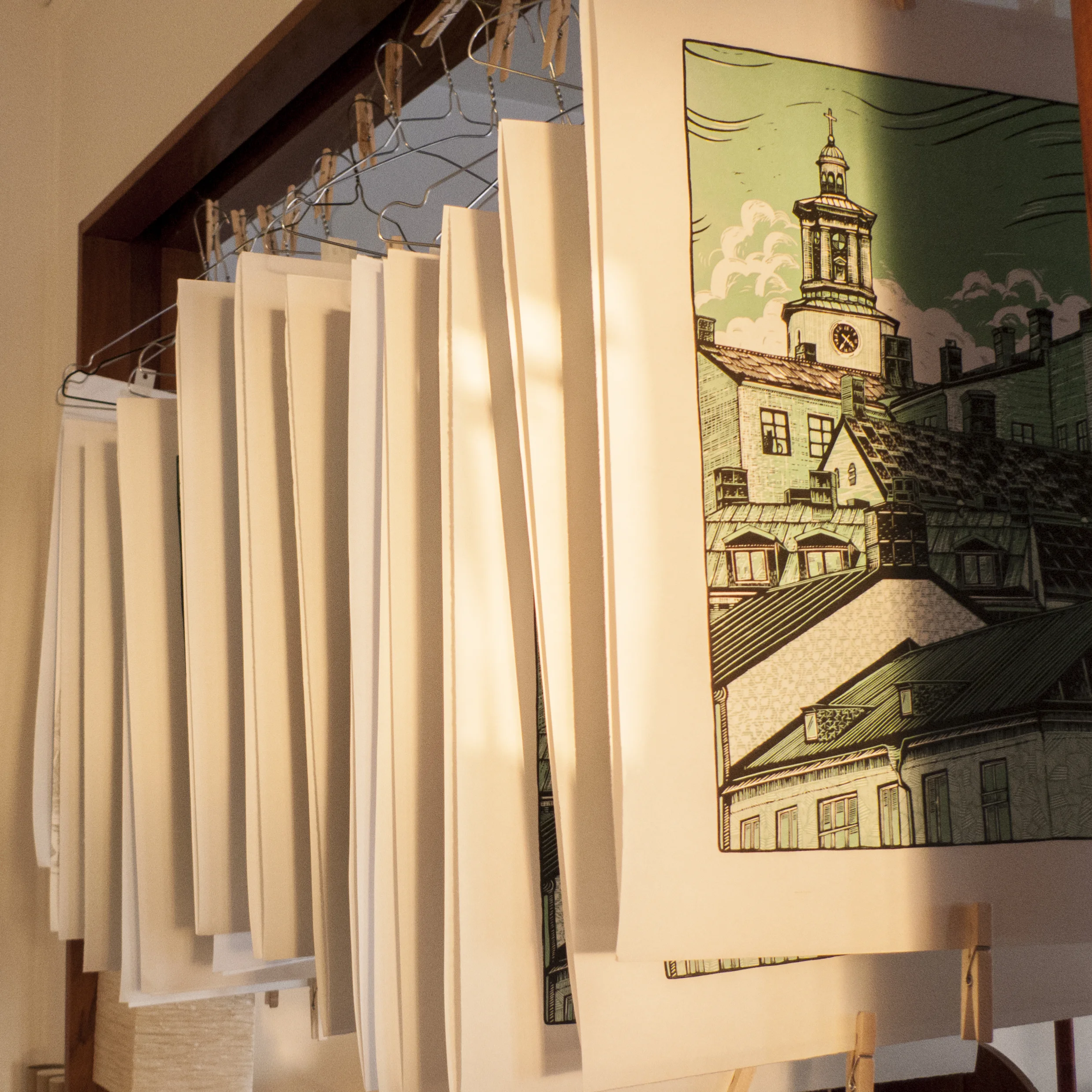 Print in light green hanging to dry.
