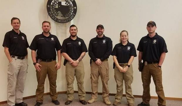 A month after Lubbock police responded to a suicidal male on Texas Tech campus, two officers were awarded the department’s Life Saving award. During the early morning hours of Sept. 13, Lubbock police officers Thomas Thompson and Jarred Dalton knew they had to make a connection with an 18-year-old Hispanic male who was threatening to jump after he reportedly climbed scaffolding on the Texas Tech campus and was threatening to end his life. Thompson and Dalton are Mental Health Officers with the Lubbock Police Department. Currently, about 15 mental health officers also serve as the department’s negotiators. SEE ALSO 1 suspect arrested in deadly North Lubbock shooting Ed Rogers: How long can Trump’s tweets and serious policy development coexist? e male — who was more than 30 feet high — paced back and forth on three feet of ledge. Thompson and Dalton knew they had to intervene in a cautious and timely manner. To become Mental Health Officers, Dalton and Thompson completed a week-long course where they got a brief overview of mental disorders, how to deal with those suffering from mental illness and what resources available to to receive treatment. While the negotiators are required to take the course, Dalton said they all have a heart for the work and want to assist those in dire need of a helping hand. Members of the team also have other duties within the department, which can also be beneficial with their two-week, on-call rotations. The demand for these officers are high. Last year, on-duty officers responded to an estimated 2,600 suicidal subject calls, according to Officer Kimberlee Crain. Crain — who also serves as the LPD Crisis Intervention Team coordinator — says their role is to provide some relief to patrol officers. “This is just a little bit of something that we try to help out with,” she said. “While they’re trained to deal with it, it shouldn’t necessarily be the job of the patrol officer, but it falls on the patrol officer, and if we can alleviate that a little bit then that’s definitely something that we try to do for them.” Dalton said he tries to lend his assistance to mental-health-related calls while on patrol — which is what prompted officers to step into action on the Tech campus on that night. LPD received word of a man who was possibly on narcotics and had left the hospital after being admitted; the IV was still in his arm. Dalton, who was on patrol, said a supervisor notified him and Thompson of the situation and they arrived on scene after 1 a.m., where they found the man, who appeared to be suffering from hallucinations. Other members of the team went to work to find out information on the man. With the help of LPD Officer Tye Edwards, the officers were able to identify him and continued to work to develop rapport — a task that took more than an hour. As other first responders arrived on scene, the two could see the man’s condition was worsening and he was turning his paranoia toward Thompson. They talked with him about tattoos and sports, finally connecting with him by speaking about a beloved family member. Dr. Andy Young, who has been with the team for about 17 years, said making that connection is critical in life-or-death situations. “One of the things that we’re looking for are things that are important to him,” he said. “Things that might help us gain some traction, and try to motivate him to do the right thing.On the flip side of that are things that we want to avoid, things that might make him angry and agitated.” Once that bond was created, the men were able to successfully reach him with the help of Lubbock Fire Rescue crews as they manned a bucket on an engine and brought him down to safety. Detective David Schrieber, who was also on scene and assisted, said he hopes this new asset to the department changes the public’s view on policing and mental health. He said it is important for people to know that calling for help doesn’t equate jail time as they can connect people to the appropriate resources for the situation on hand. “Everyone is going to have a bad day,” he said, “and you’re just dealing with that person on their bad day. It’s just a bad day, we’re going to get through it and you’re going to be fine.” After being on the team for more than a decade, Young said he is excited to be working alongside well-trained individuals as their experience grows with each call. Over time, Thompson said, people’s views on mental health are starting to change and as a team they are working to help expedite that process. “I think as our society becomes more aware of how many people struggle with mental health issues,” he said, “it can be overwhelming to look at the numbers, but realize they’re all people. This could be your family member, this could be your loved one, a friend, a coworker. “Anyone can experience crisis, and so it’s nice to know that we have the training the willingness to say, ‘You’re a human being, just like me. We just want to help you.’” Link to the AJ Article: http://lubbockonline.com/local-news/news/2017-11-05/lubbock-police-train-special-mental-health-officers