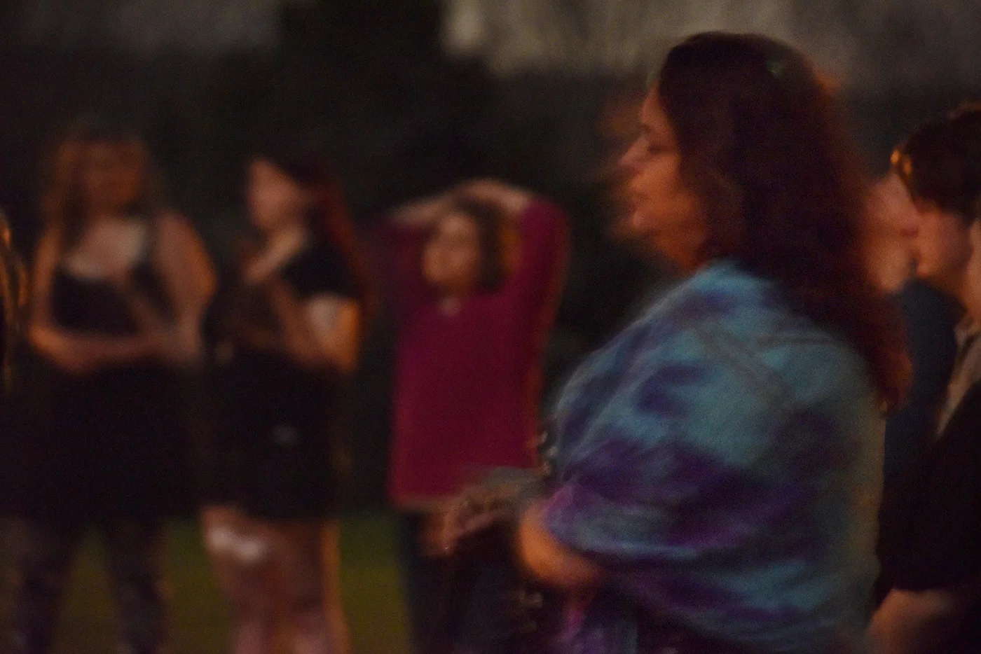 Priestess and witch, Kerry Lynn, sways while singing chants during a lunar gathering on Saturday, April 8, 2017. Lynn grew up Catholic and similarities with Catholic traditions can be found within Wicca ceremonies since Christianity was adapted from paganism. 