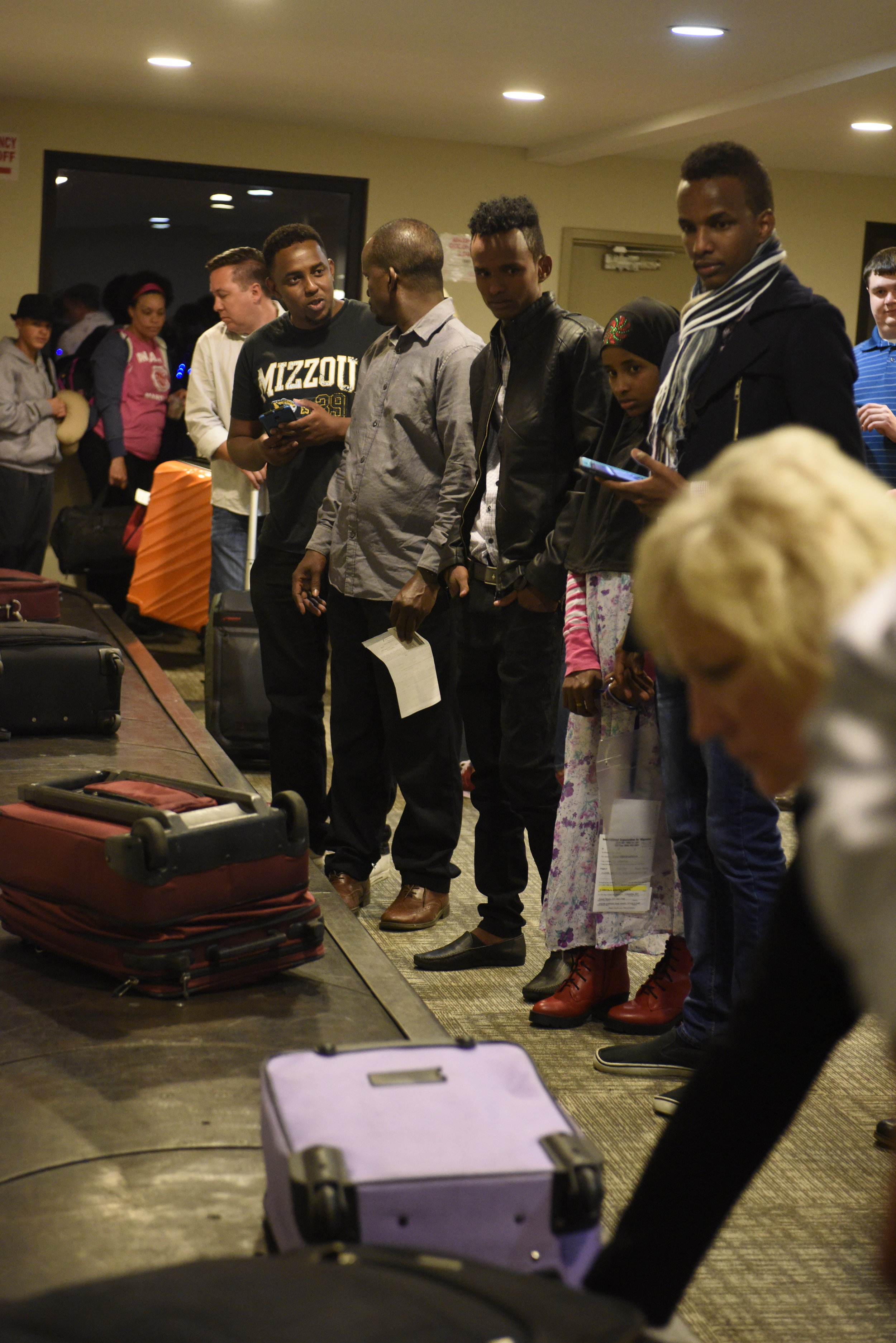 The Abdirahman family looks for Yasin's luggage at the baggage claim at the Columbia Regional Airport after months of separation on Tuesday, April 18, 2017. I was by myself. Yasin spent two months alone in Ethiopia. "I was going to school in the morning. And I was sleeping in the afternoon. All the night I would stay in the house by myself. It was lonely," Yasin said.
