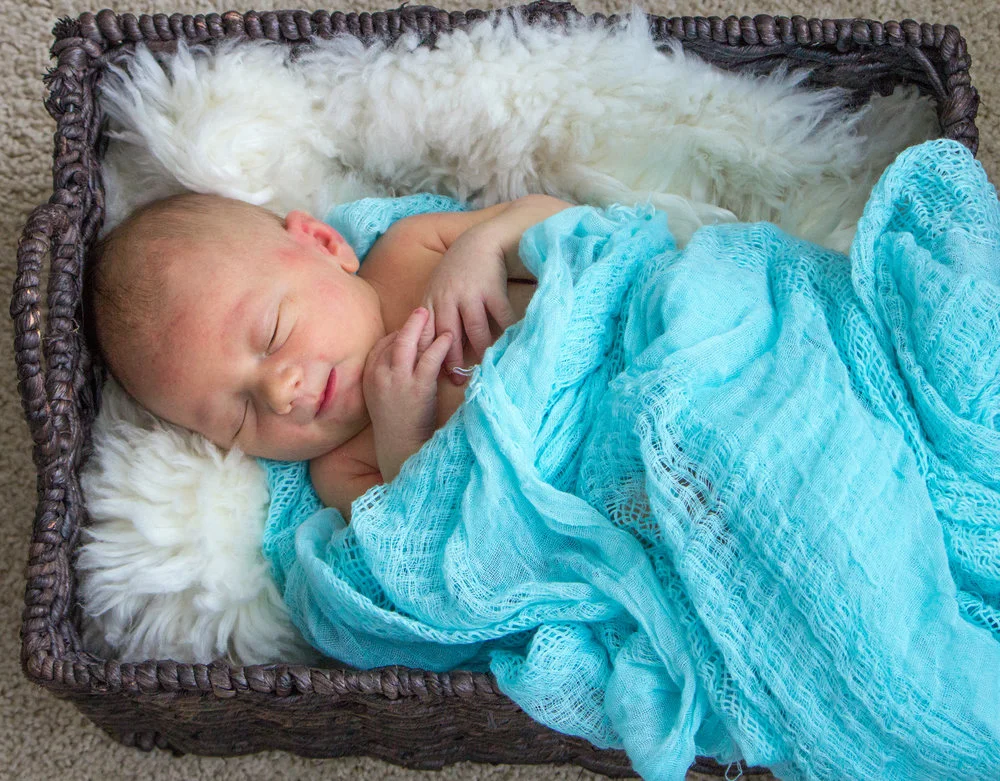 Rule of Thirds: This baby's face follows the rule! It is in the top right third of the frame.