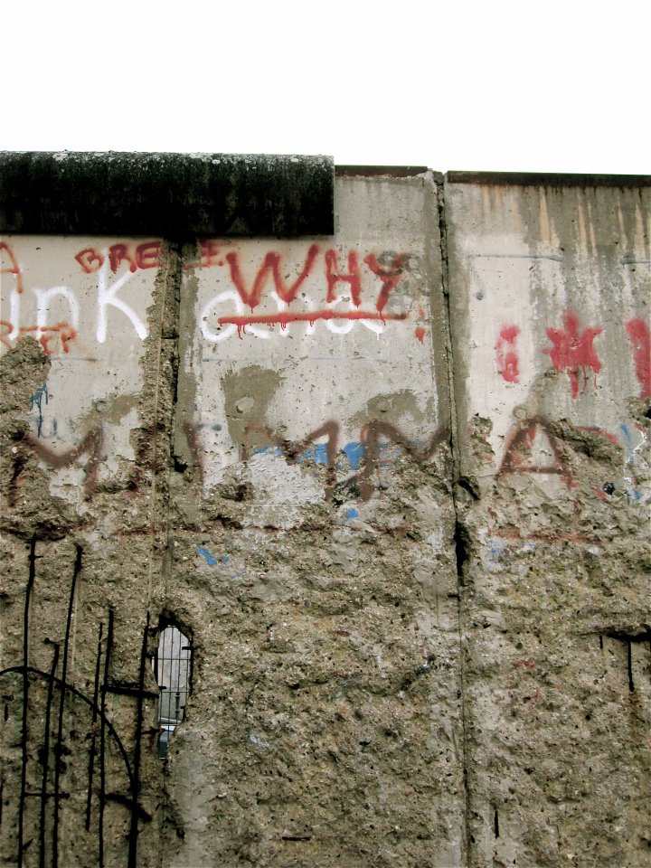 A photo of a section of the Berlin Wall at the Topography of Terror exhibit, with a poignant bit of graffiti.