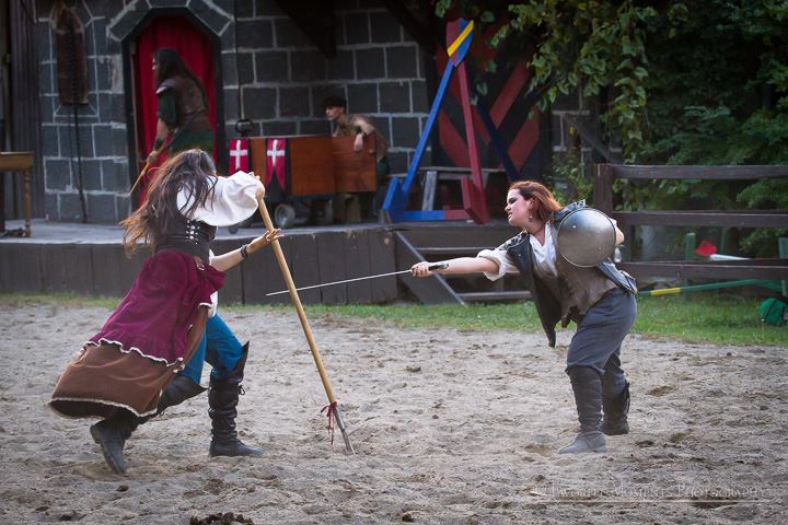 NYRF 2015, opening weekend - a fight with my favorite pirate during the melee on the joust field, and an interesting pairing of sword & buckler vs. trident (very nautical).