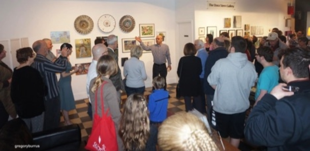 Image: Robert Ramos, Curator of Arts Unbound, talking to the audience during the recent Friends of Arts Unbound 2016 Event . 