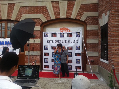 Image: Gregory Burrus. Patrick Hilaire Photography in action at Blues Muse Step and Repeat