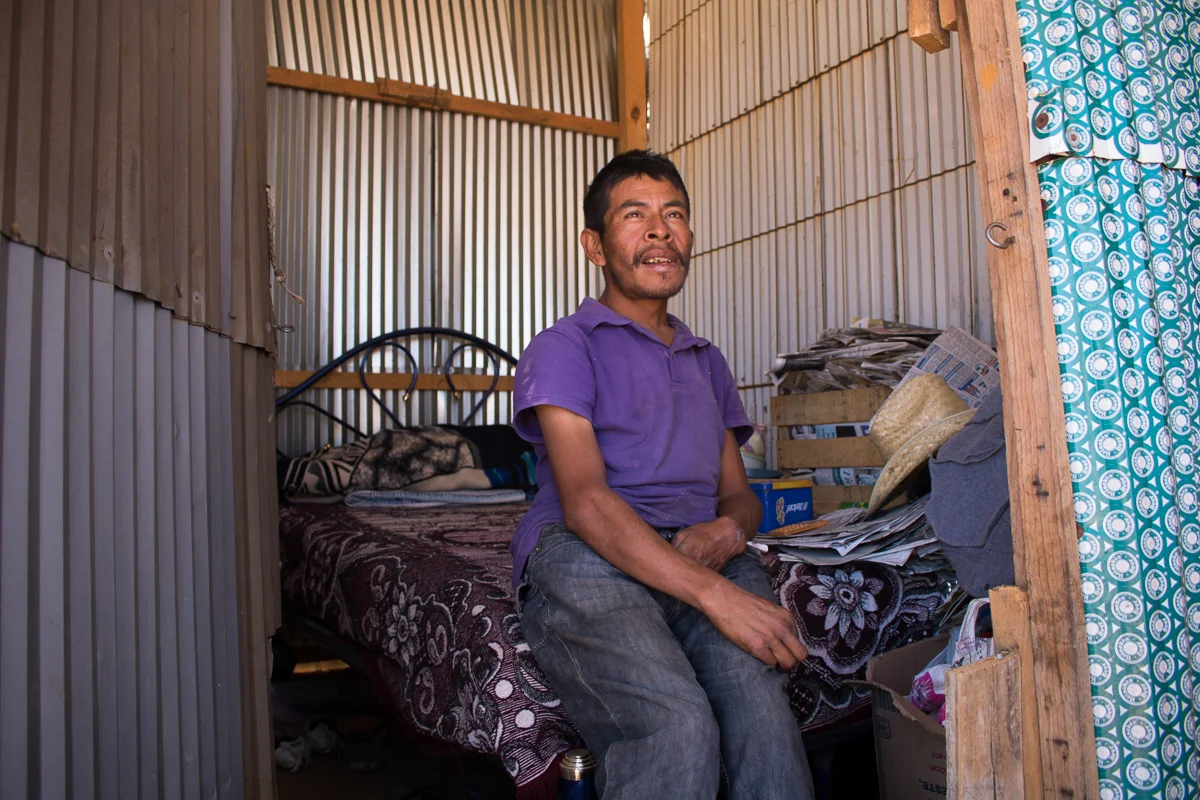 Eliseo Vargas, 35, sits on the bed in his room in Zaachila, Mexico on Friday, Jan. 13, 2017.
