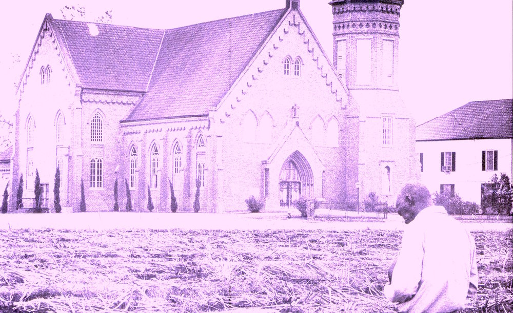 Man+praying+in+front+of+OLOP-vacherie copy.jpg