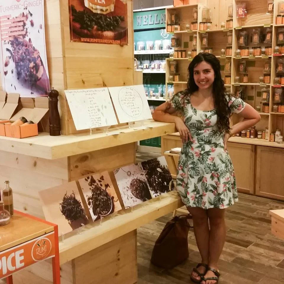 Hi! This is me being super dorky next to my work :)