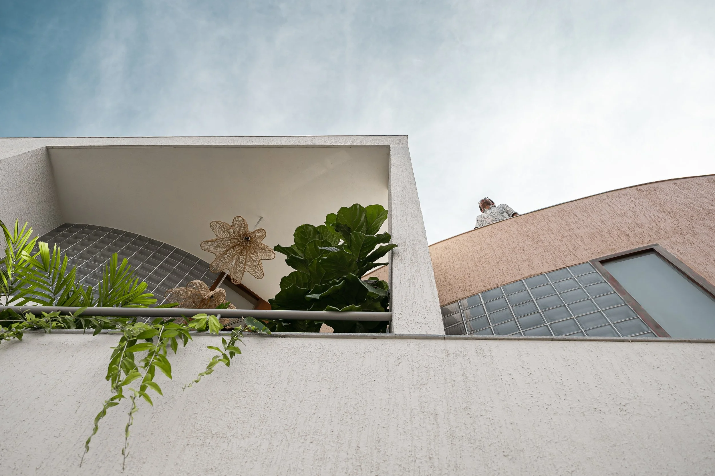  House K is a 5300 sq ft residence built on a 50'×80' plot, located within a quiet, gated community in Sarjapur, Bangalore. Designed for a couple in their 60s, the home reflects their quiet dignity through a minimal and restrained approach—open, ligh