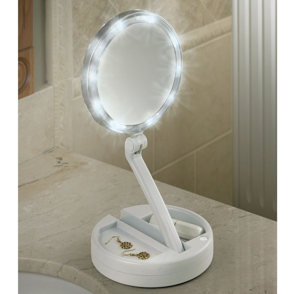 Hammacher_Schlemmer_Foldaway_Mirror_1.jpg