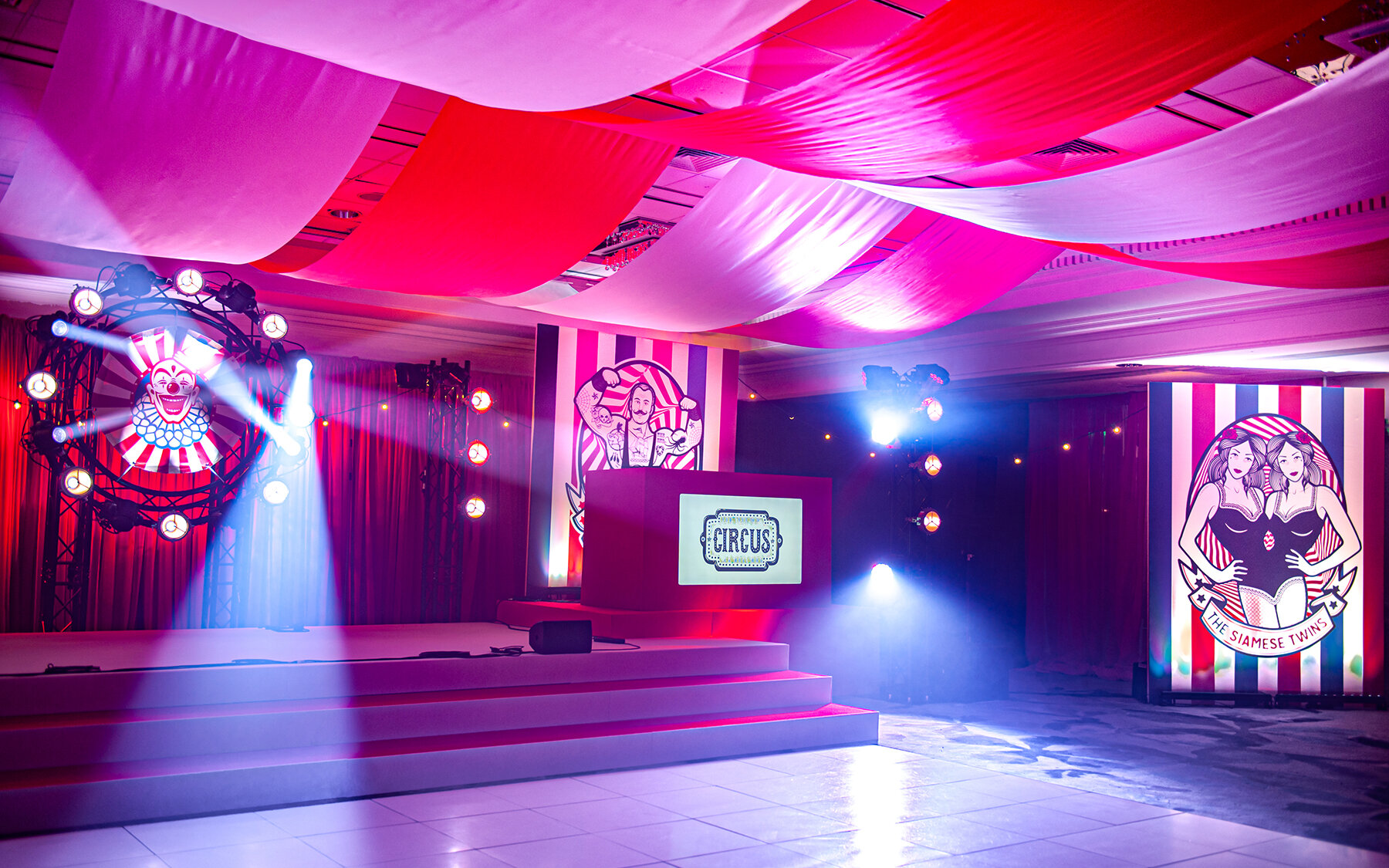 reveries-events-brighton-circus-themed-party-hilton-metropole-event-design-staging-lighting-drapes-dancefloor-audio-technical-management-o.jpg