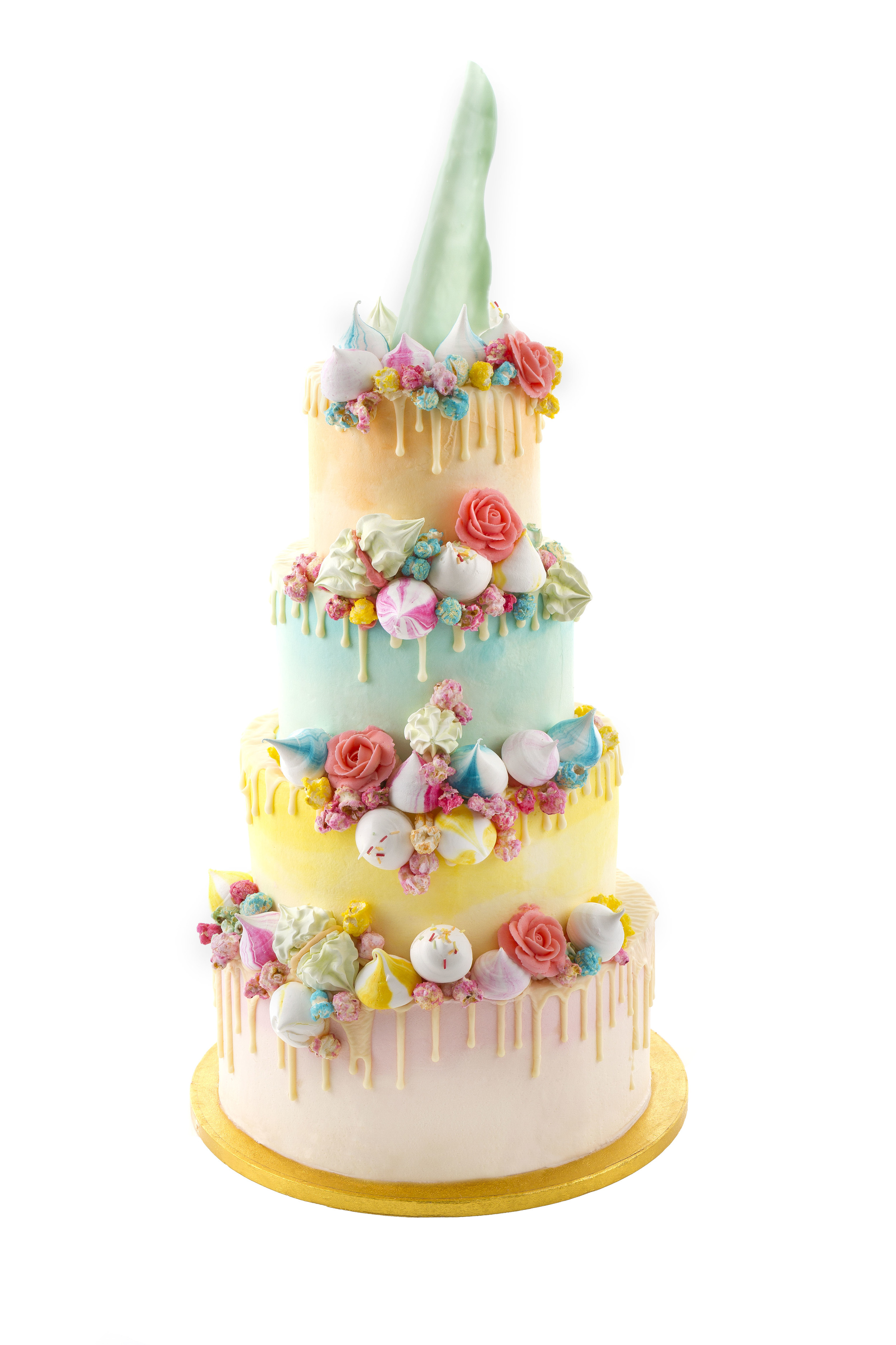 Add piped buttercream roses for a whimsical rainbow effect.