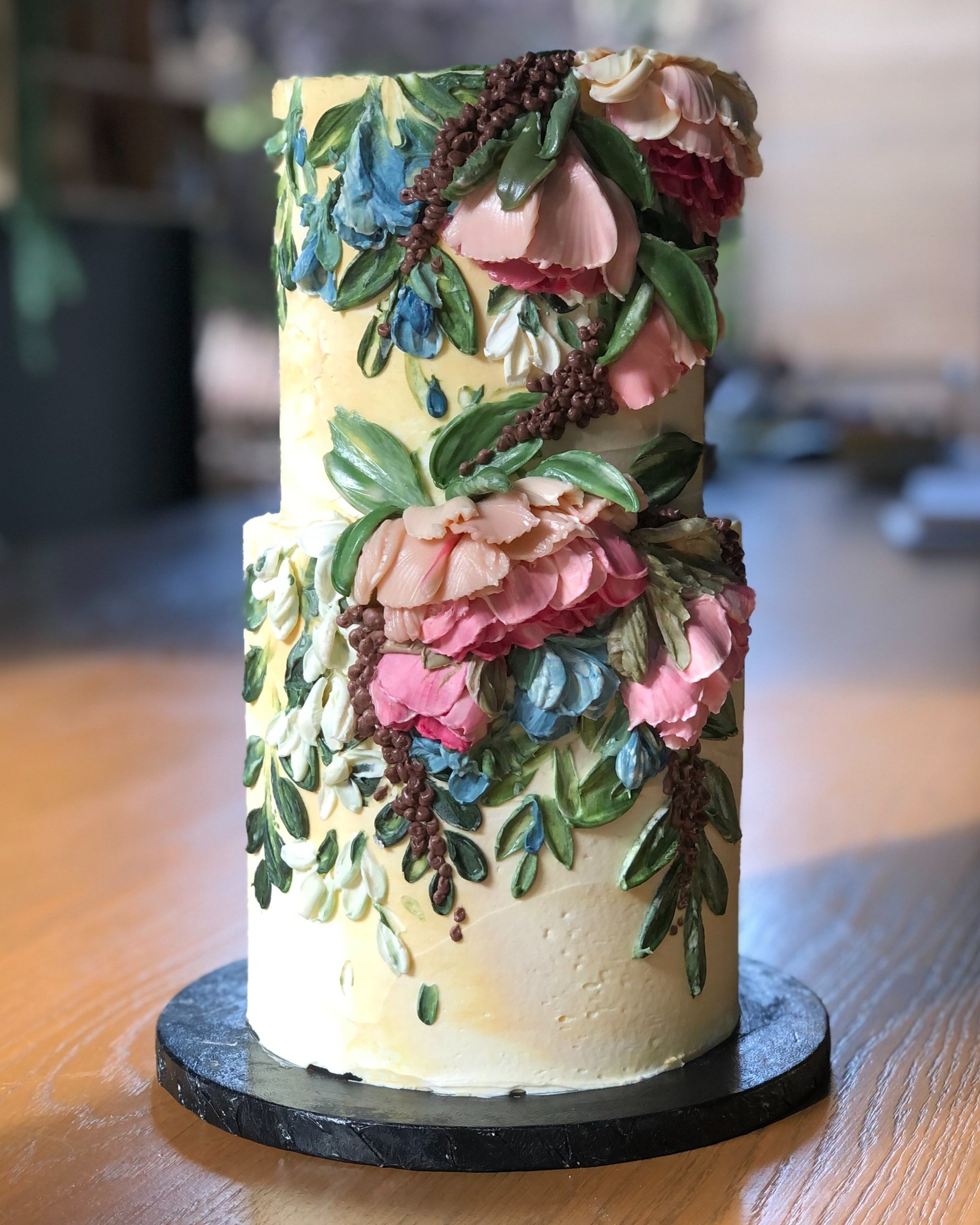 I took a palette knife cake decorating course this weekend! The Peony Roses  cake was done with buttercream while the Tea Roses cake was done with  ganache. : r/cakedecorating