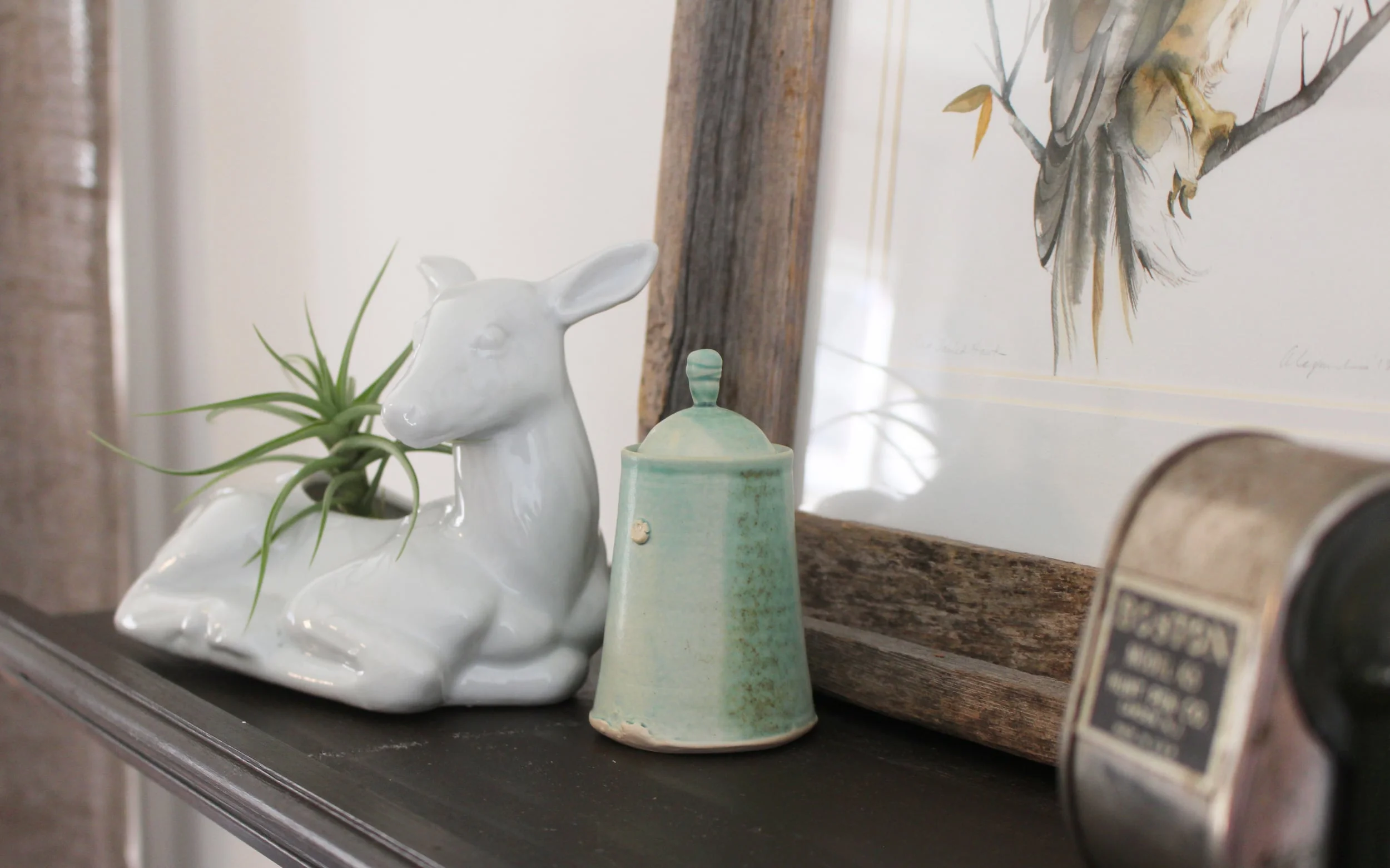 One of my favorite areas in my studio. The little sea-foam green jar is from Illyria Pottery. I love her work!