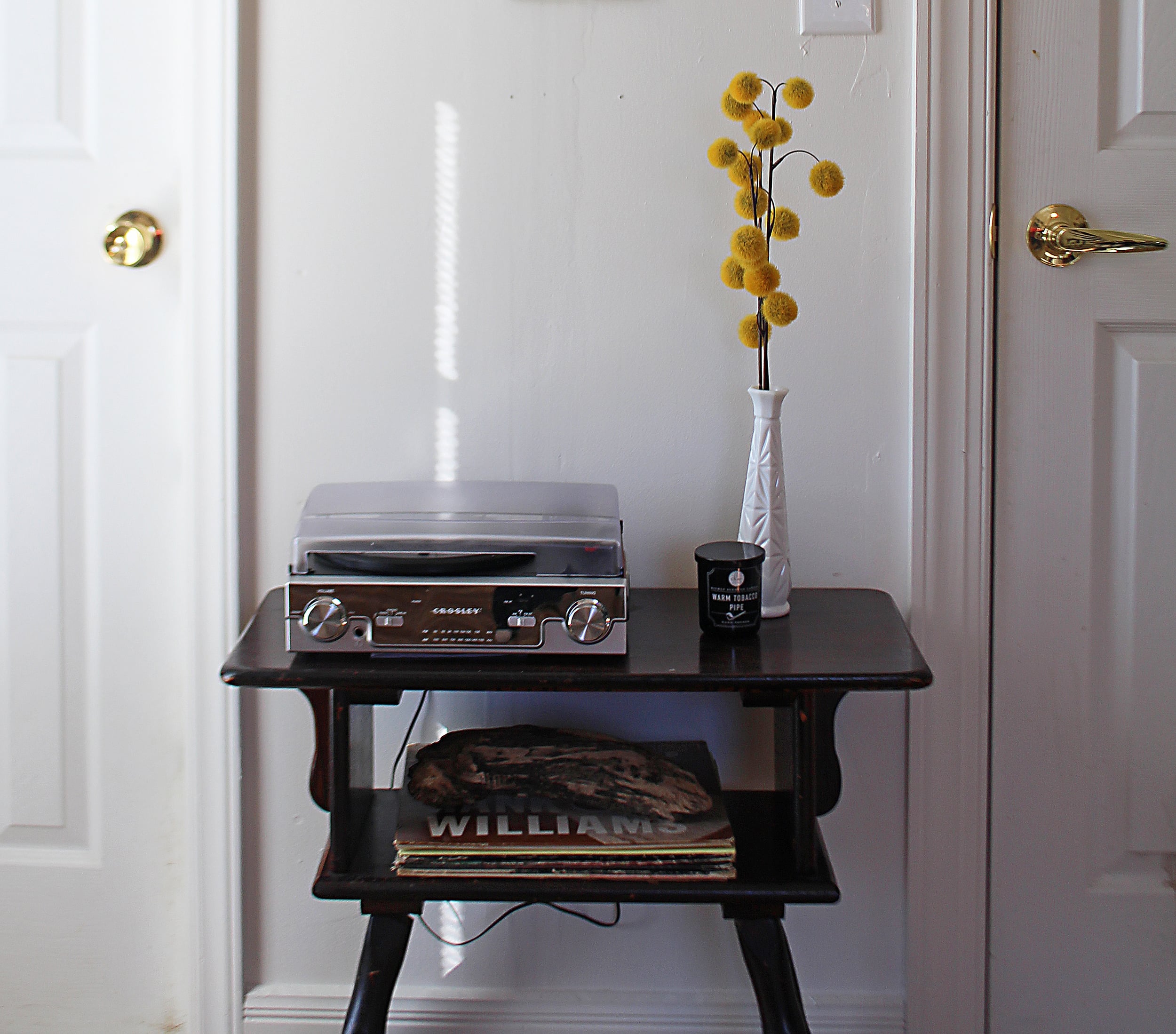 My dad loved listening to his dad's old records. I grew up listening to Hank Williams and Ernest Tubb. This corner is a tribute to my dad and a sweet reminder of my childhood. Just turning the metal knobs on this stereo takes me back!