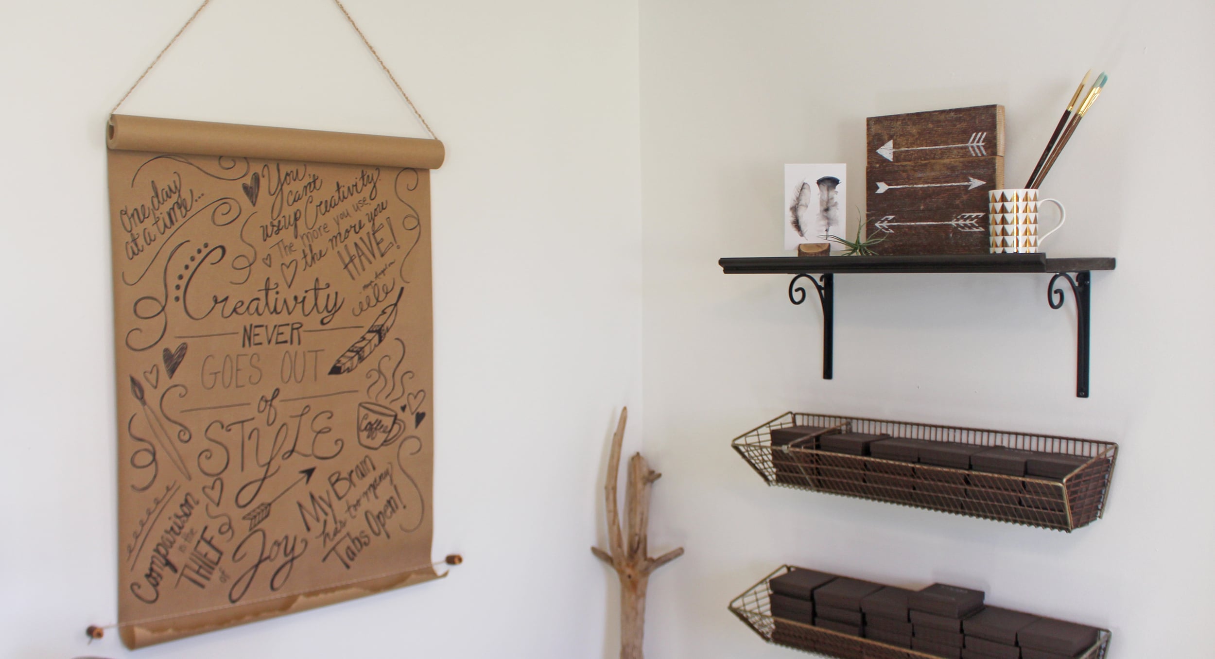 This is my packing corner. The wooden arrow piece is from Olive + Grey . They also made my signs for me. 