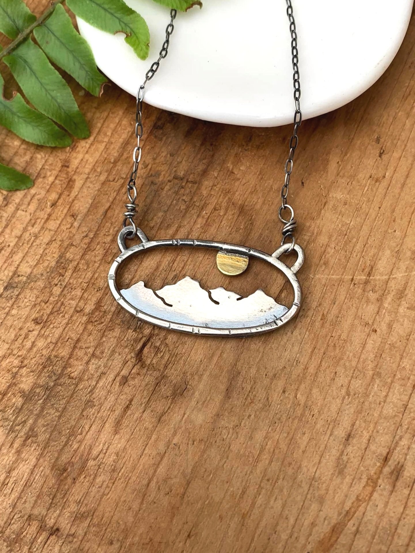 Karisma-Silver-Mountain-Sun-Oval-Necklace.jpg
