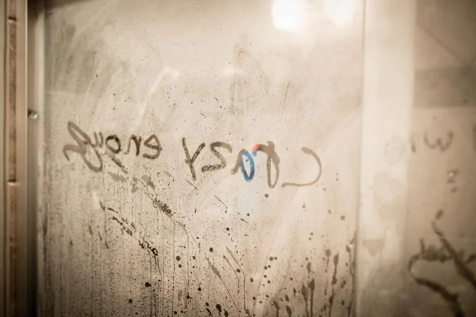 Shower door that reads Crazy Love.