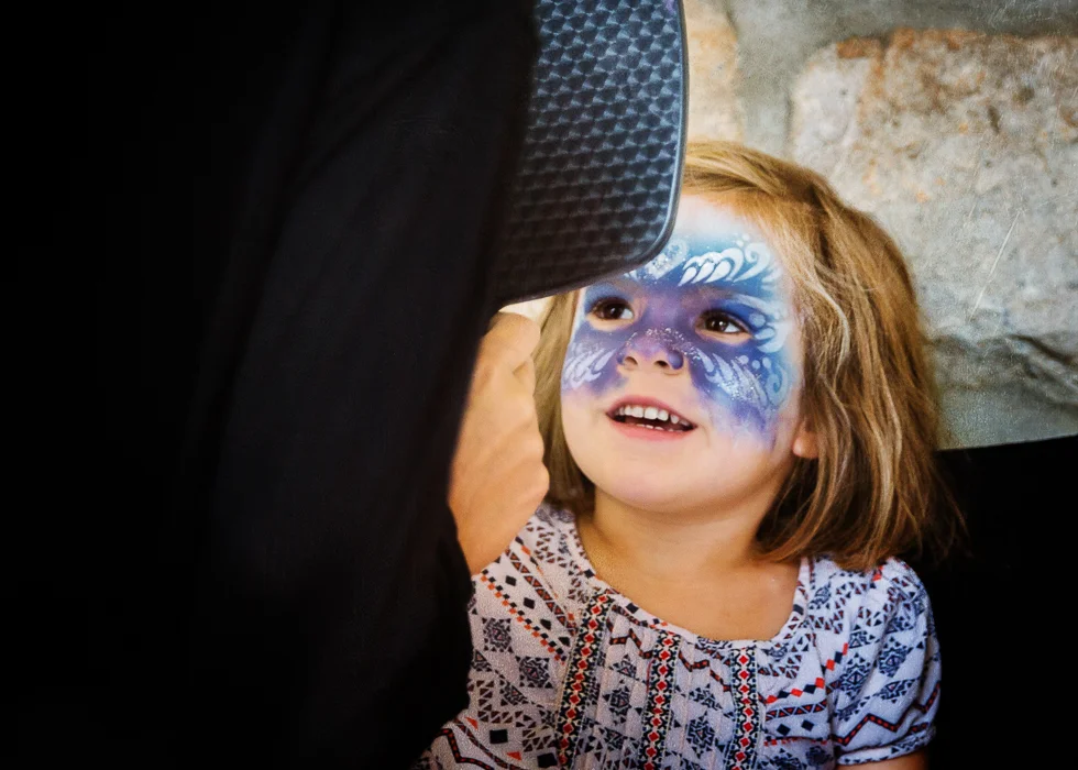 child with face paint