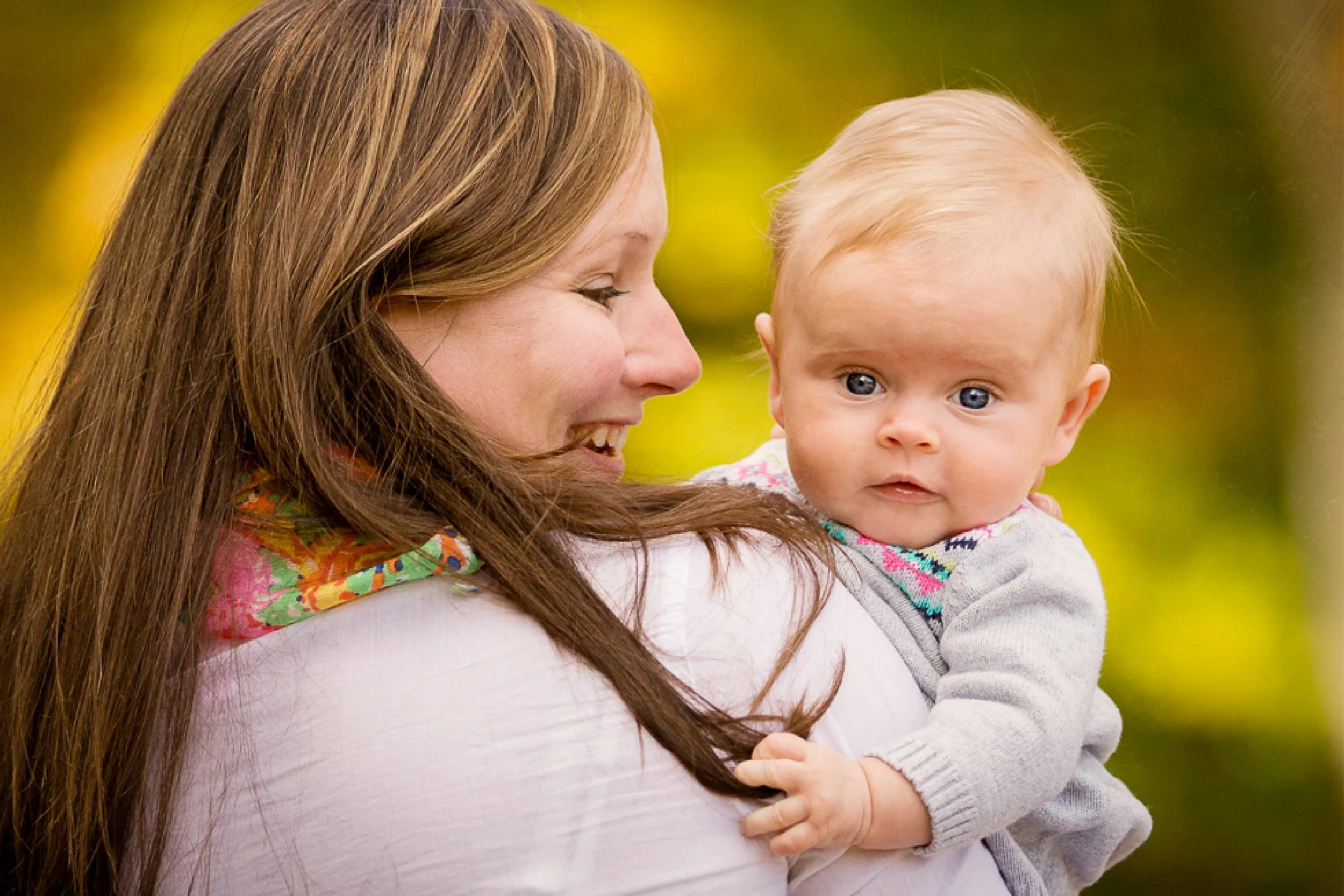 beautiful mother and daughter portrait of four month old.