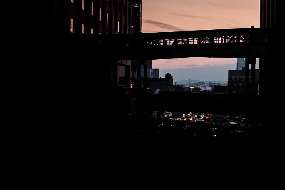 view of the statute of liberty from New York City's High Line Park.