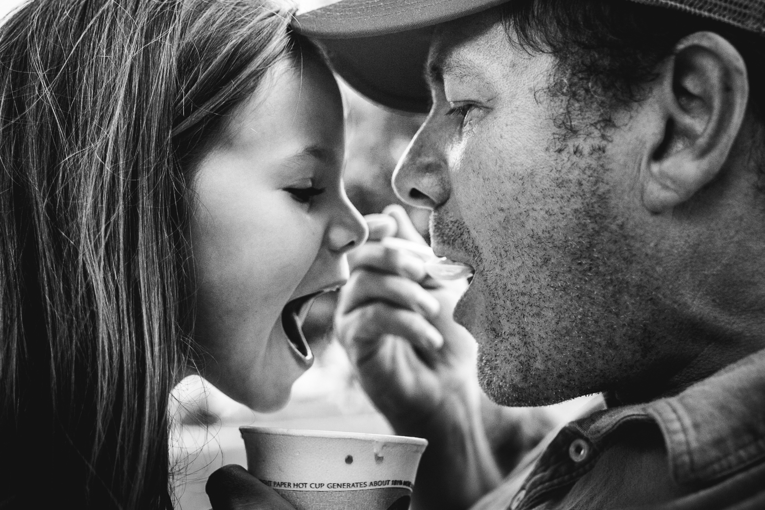 r_wyatt_father_daughter_sharing_a_snowball-3.jpg