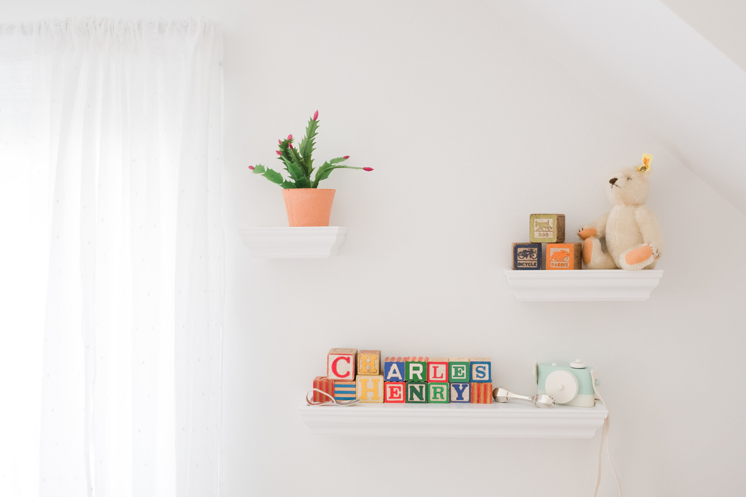 Cute wall display in baby boy nursery