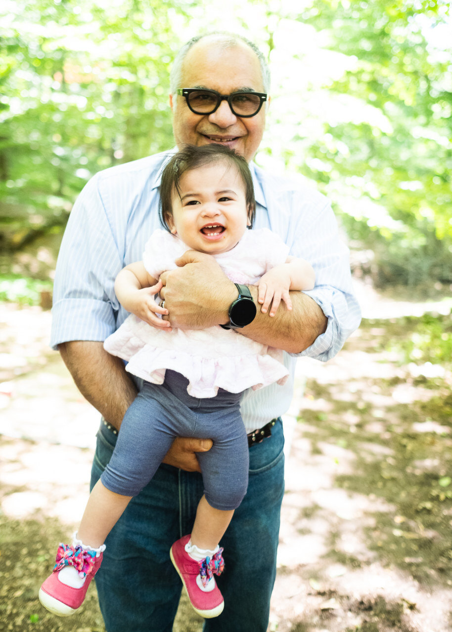 grandfather-holds-grandaughter-for-camera.jpg