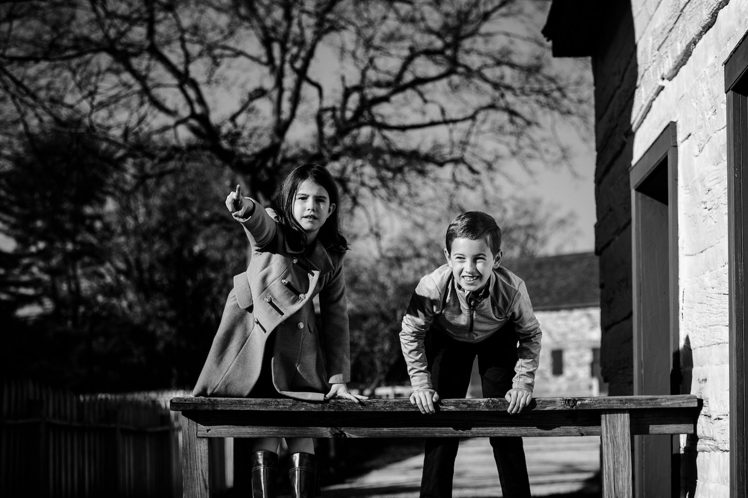 boy and girl climb on deck