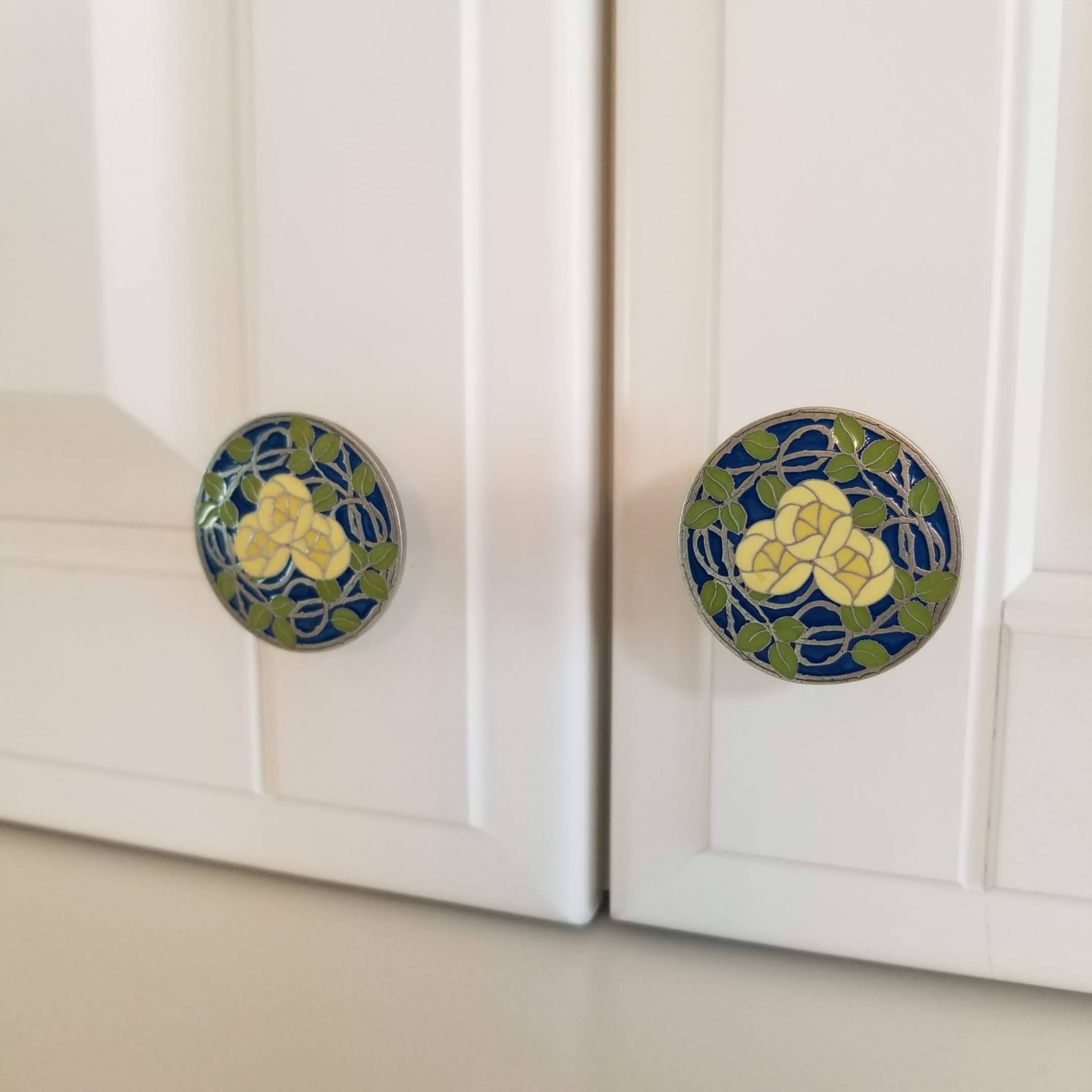 Delaney's Rose knobs in blue enamel.jpg
