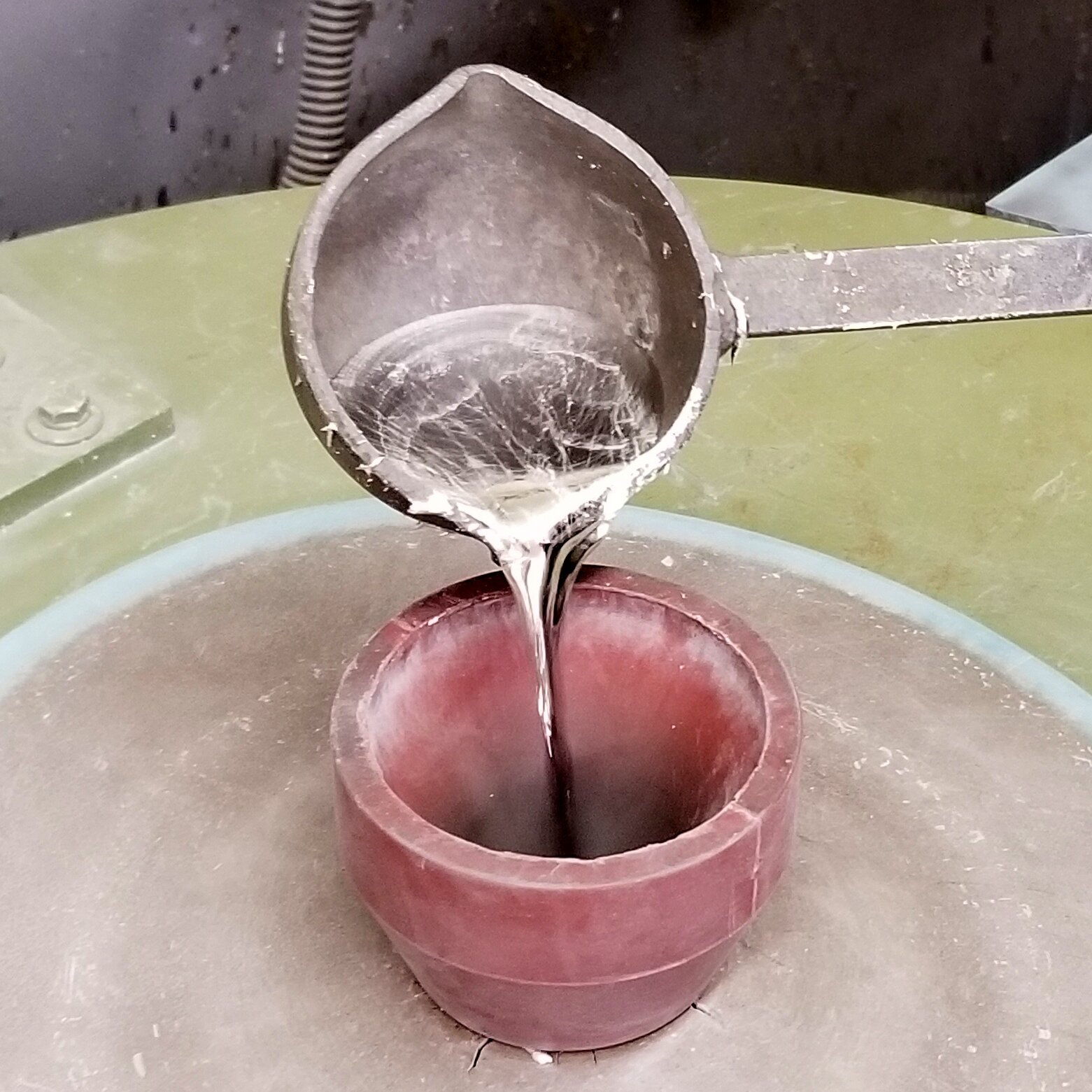 Pouring molten pewter