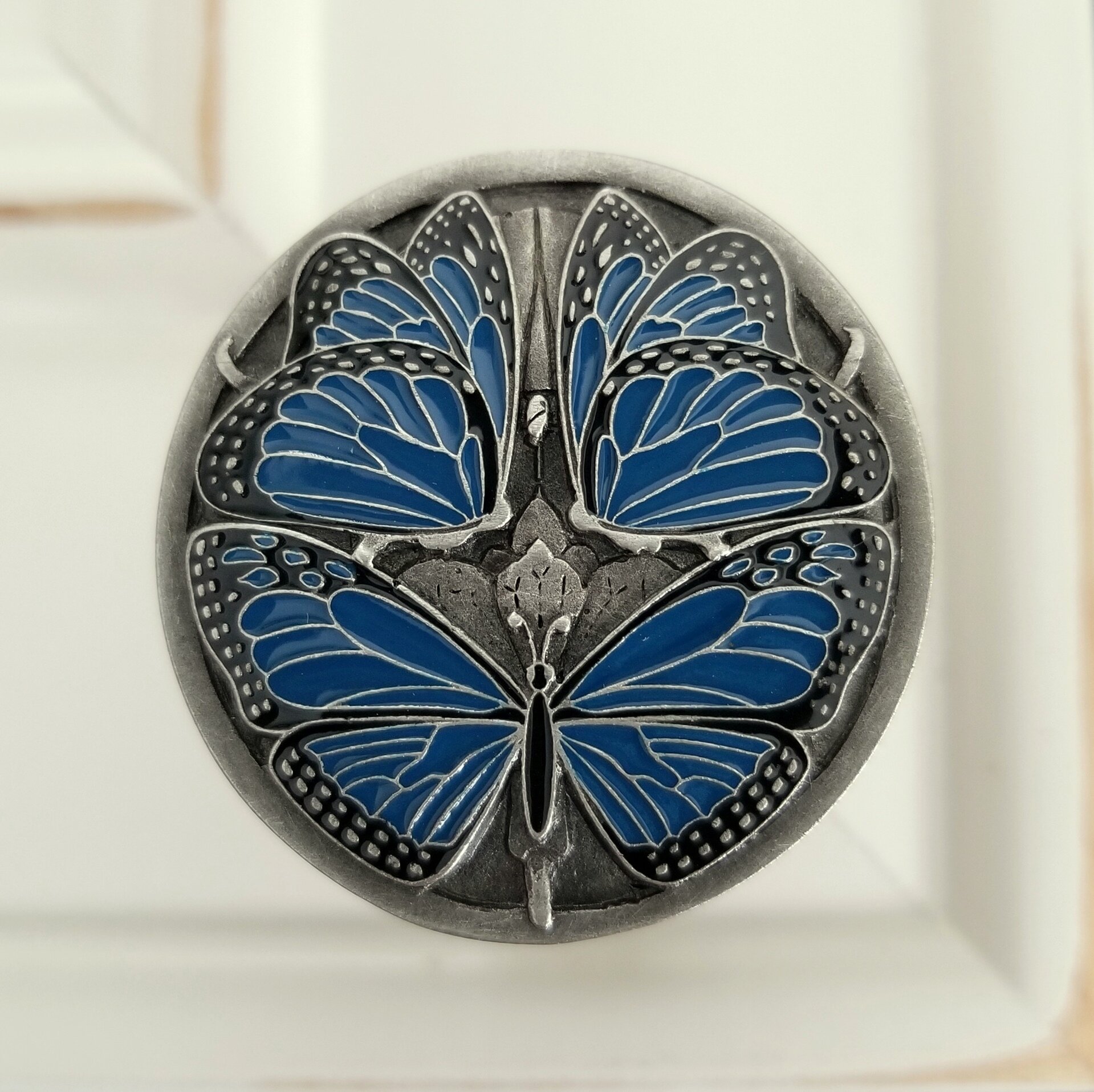 Blue Butterflies in Antique Pewter on white cabinet