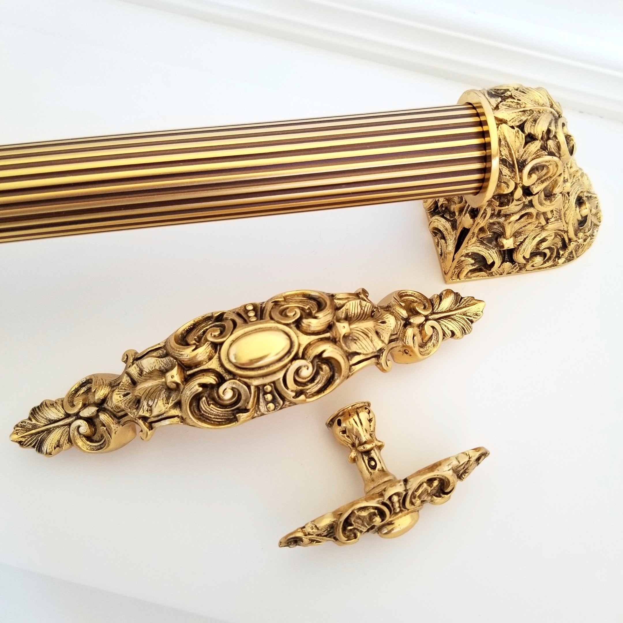 3 Queensway knob and pull with Acanthus appliance pull in 24K gold finish. Hand made in USA by Notting Hill Decorative Hardware..jpg