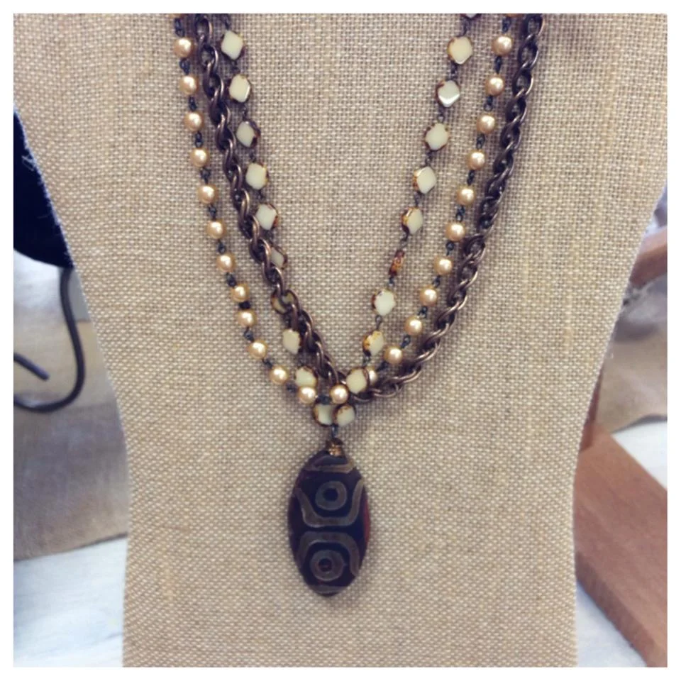 triple strand short necklace.jpg
