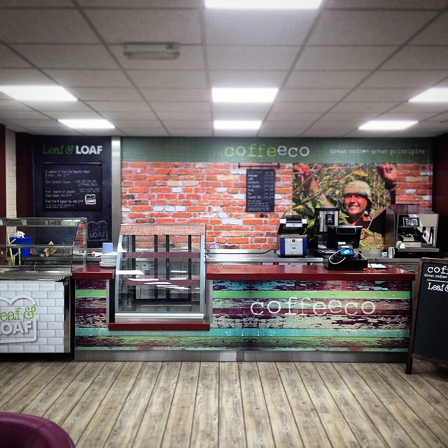 Cafe makeover with counter fascia and back wall wrap. Design, print, installation, sign writing.