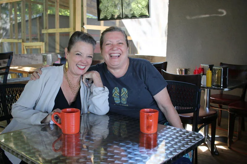 Poppy Tooker and Carolyn Simmons, winner of the James Beard Foundation's Better Burger Project, on the patio of Blue in Shreveport. CHRIS JAY