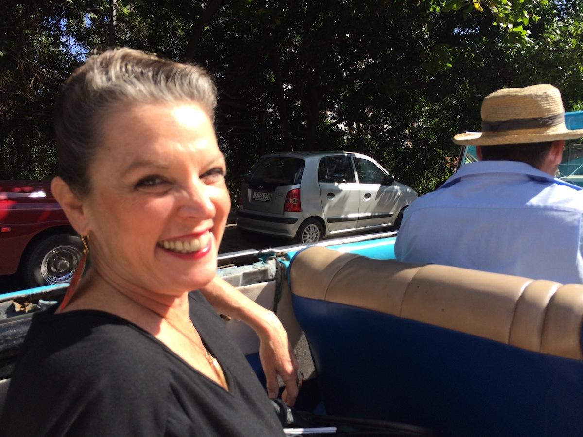  Poppy tooling around in a classic car, so ubiquitous in Cuba.  VIVIANA RIVES 