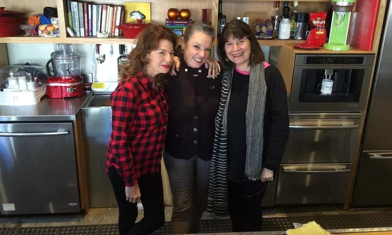 Host Poppy Tooker with NPR's Kitchen Sisters Davia Nelson, left, and Nikki Silva, right. JOE SHRINER / LOUISIANA EATS