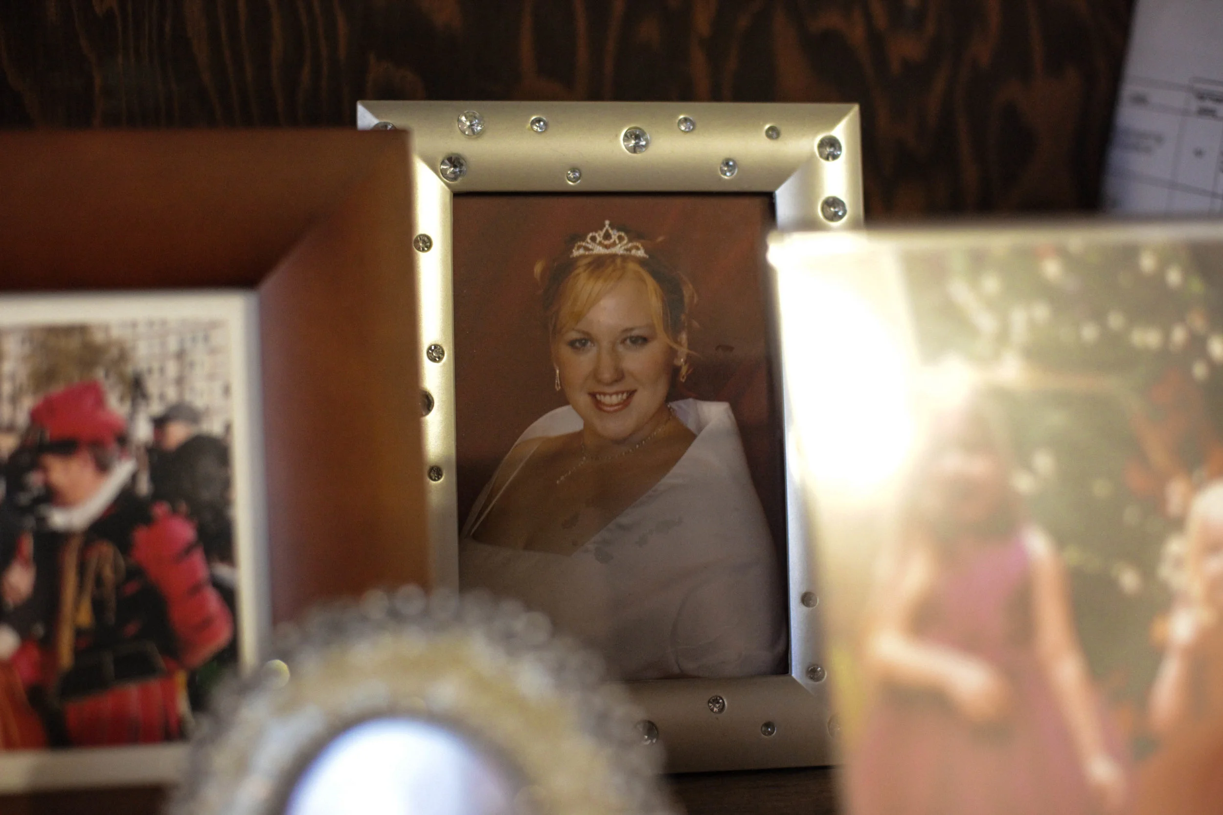 A photo of Brooks in college sits on her mantle in her home on Oct. 19, 2016 in Quincy, Mass.