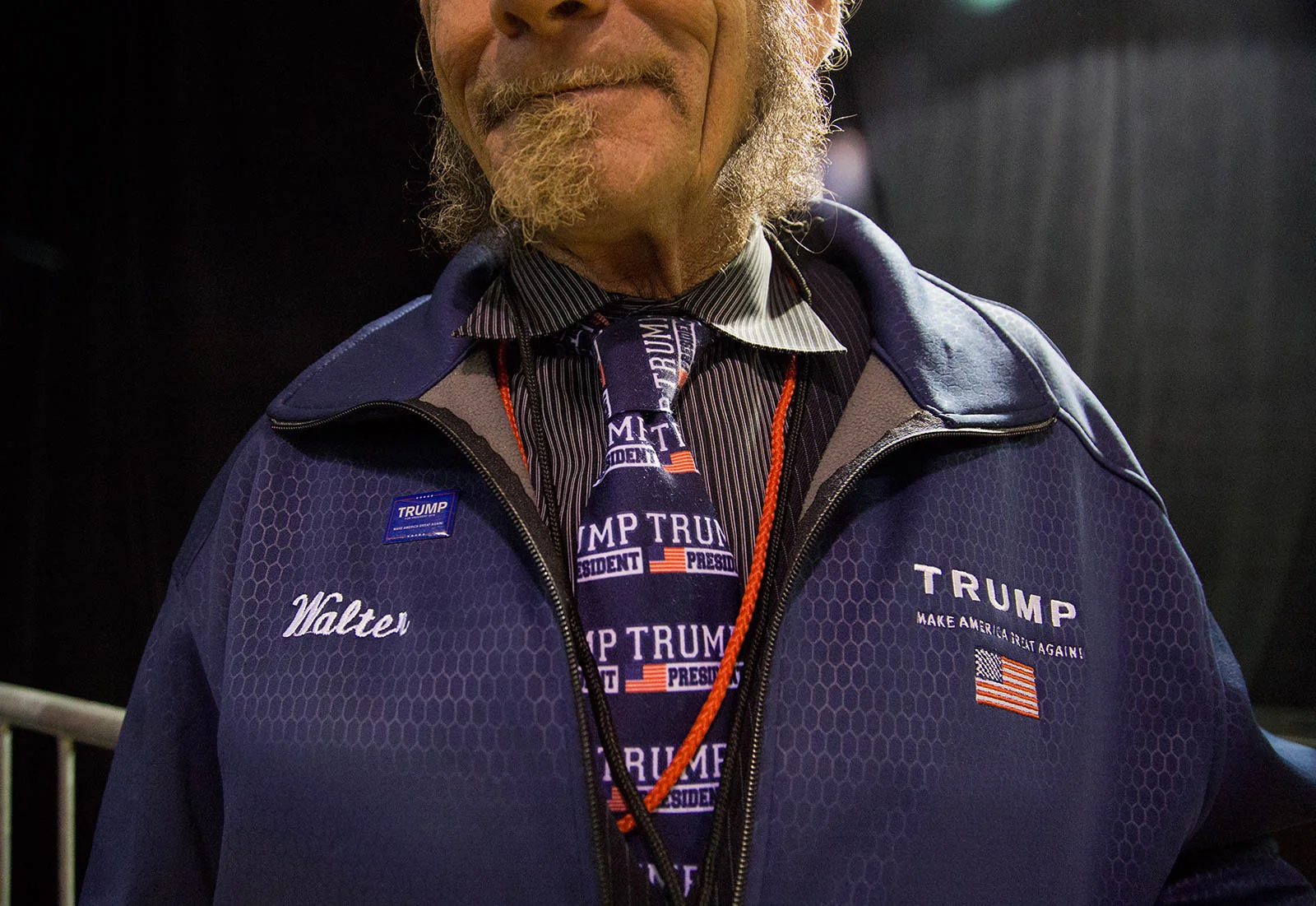 Walter Collings, 65, of Wilmington, poses for a portrait during the "Donald J. Trump for President Rally" on Oct. 28, 2016 in Manchester, N.H. He has been a volunteer for Trump's campaign since last September, and this rally marked his 33rd event, he said.