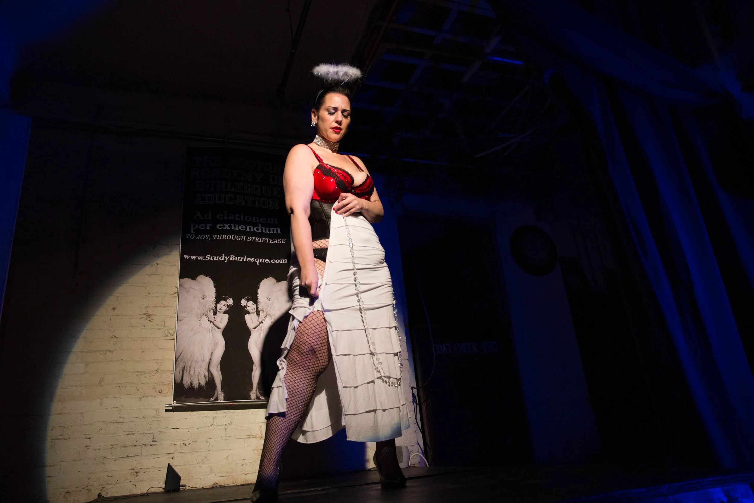 Amy Brooks performs her first burlesque routine in front of an audience during the Boston Academy of Burlesque Education student showcase on Nov. 6, 2016 in Cambridge, Mass.