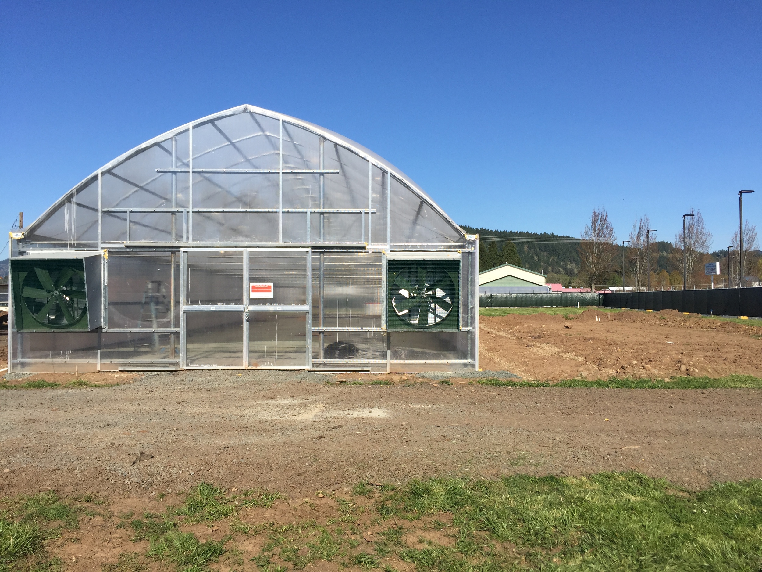 For those of you who might be curious, the greenhouse is a Conley 3600 - heated by gas and cooled by a high-pressure fog system. 