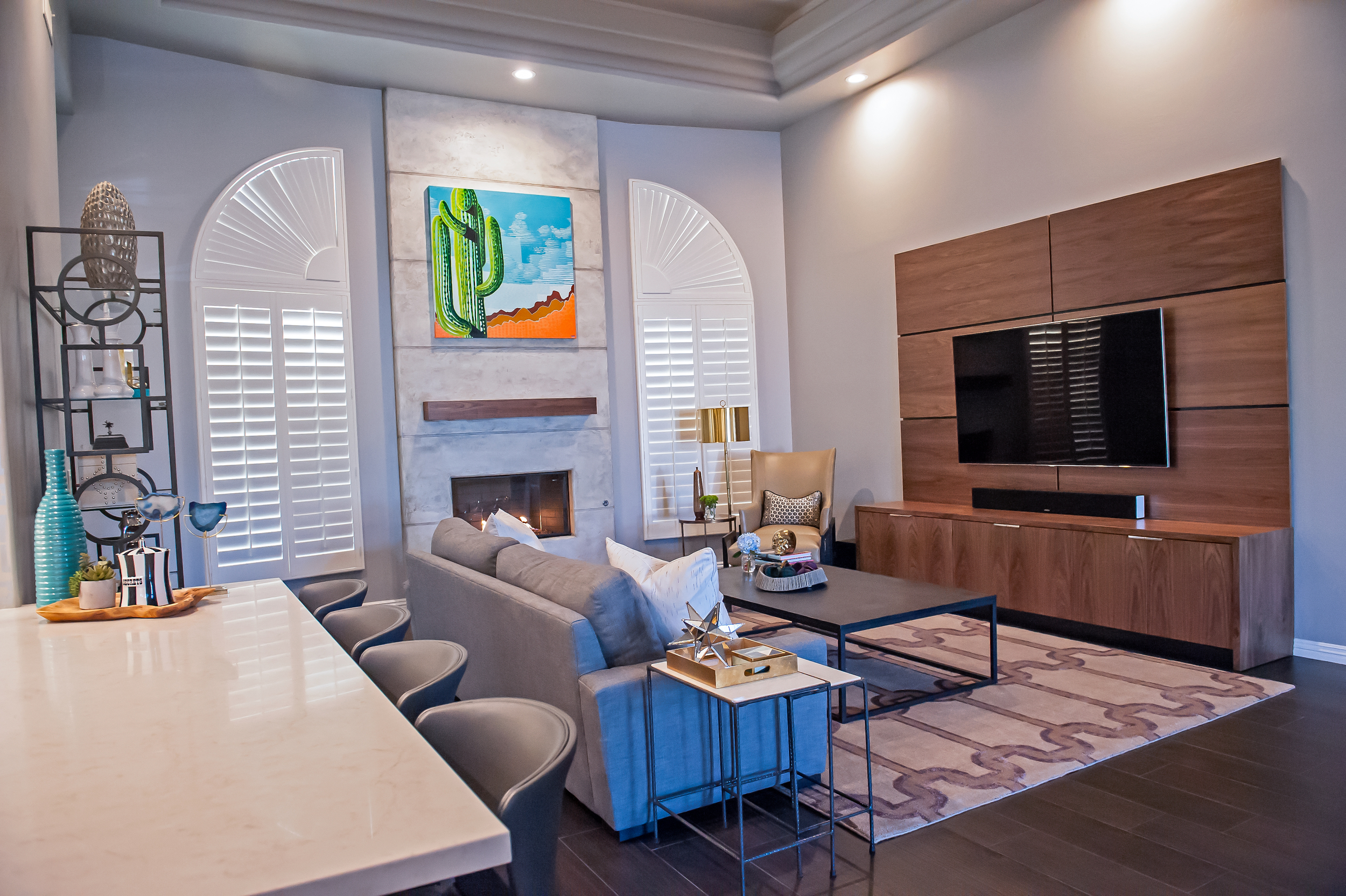 After, Bold Living Room with Custom Fireplace and Entertainment Center