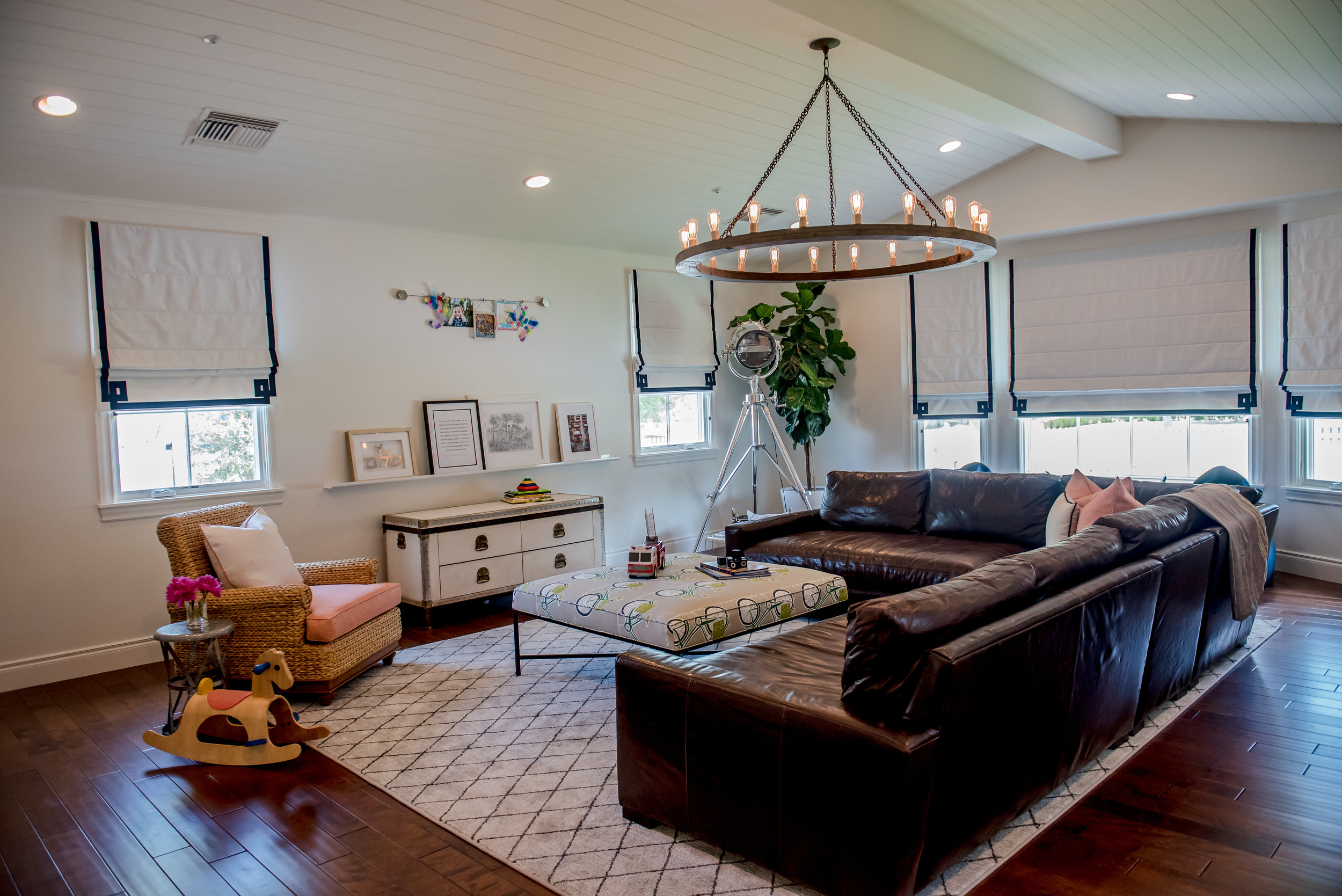 28+Family+Play+Ottoman+Sofa+Romanshades+Rug+Chandelier+Transitional.jpg