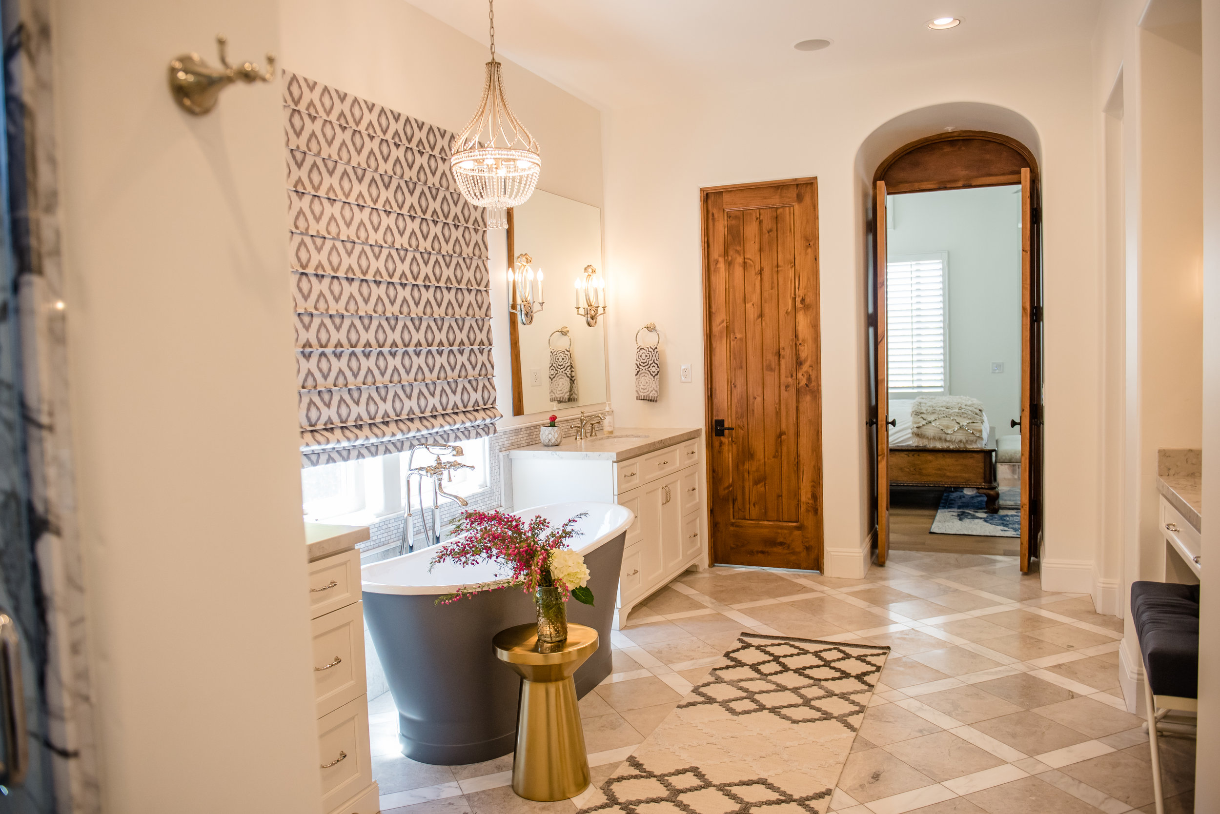 37+masterbath+romanshade+marble+inlayfloor+graybathtub+vanity+chandelier+runner.jpg